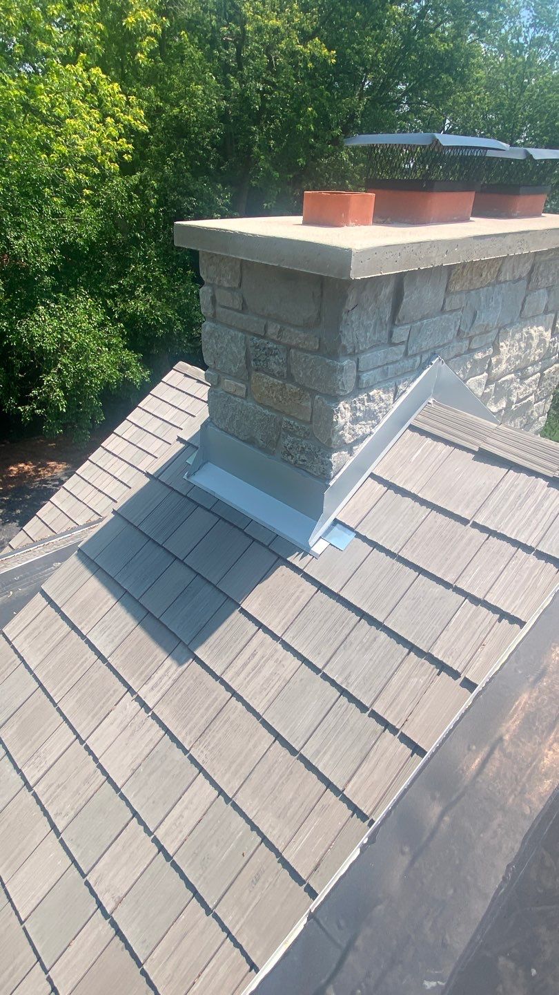 DaVinci Roof Installation with Snow Guards in Oconomowoc Lake by Custom Installations