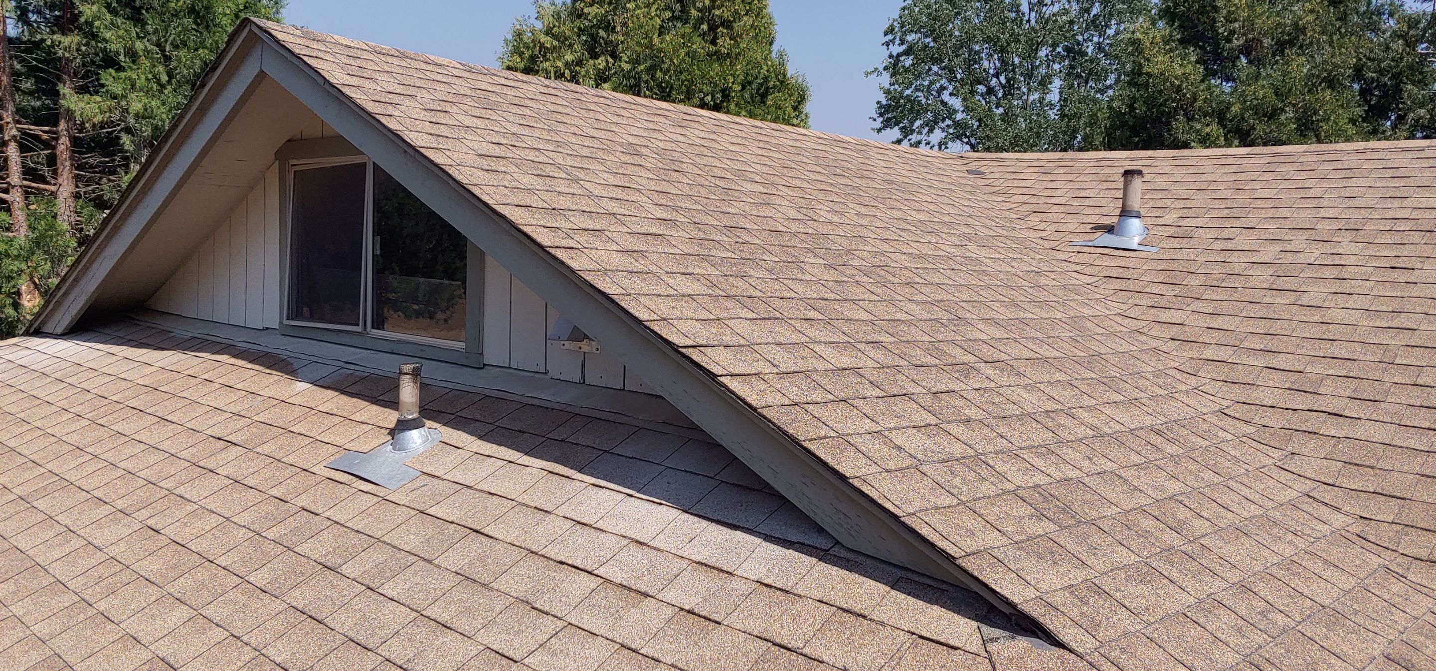 Residential Roofing Installation using Standing seam metal roofing system by Straight Edge Roofing Inc