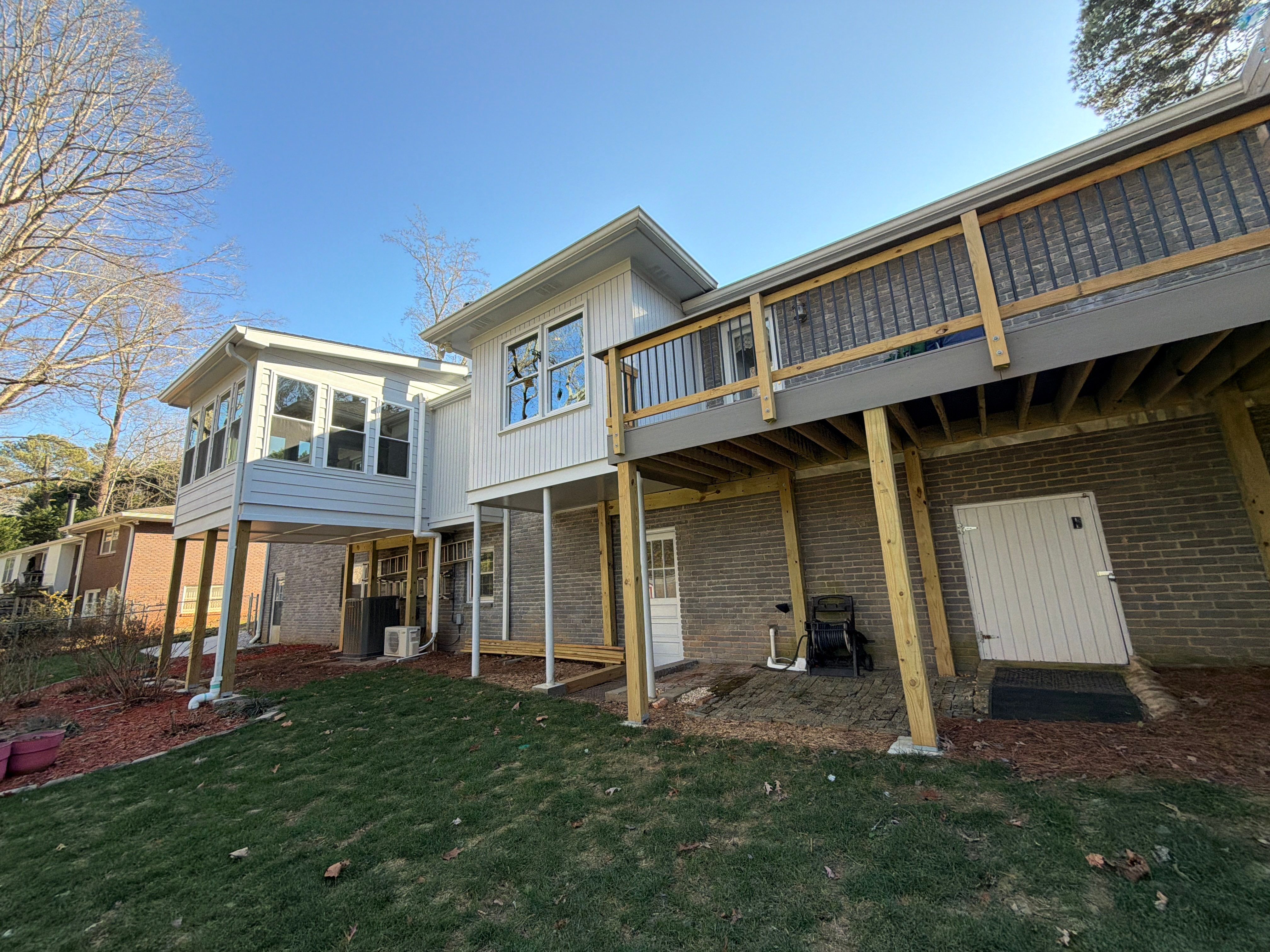 James Hardie Siding Replacement, Trex Railing Install, Exterior Painting, and Staining in Stone Mountain, GA by Nelson Exteriors 