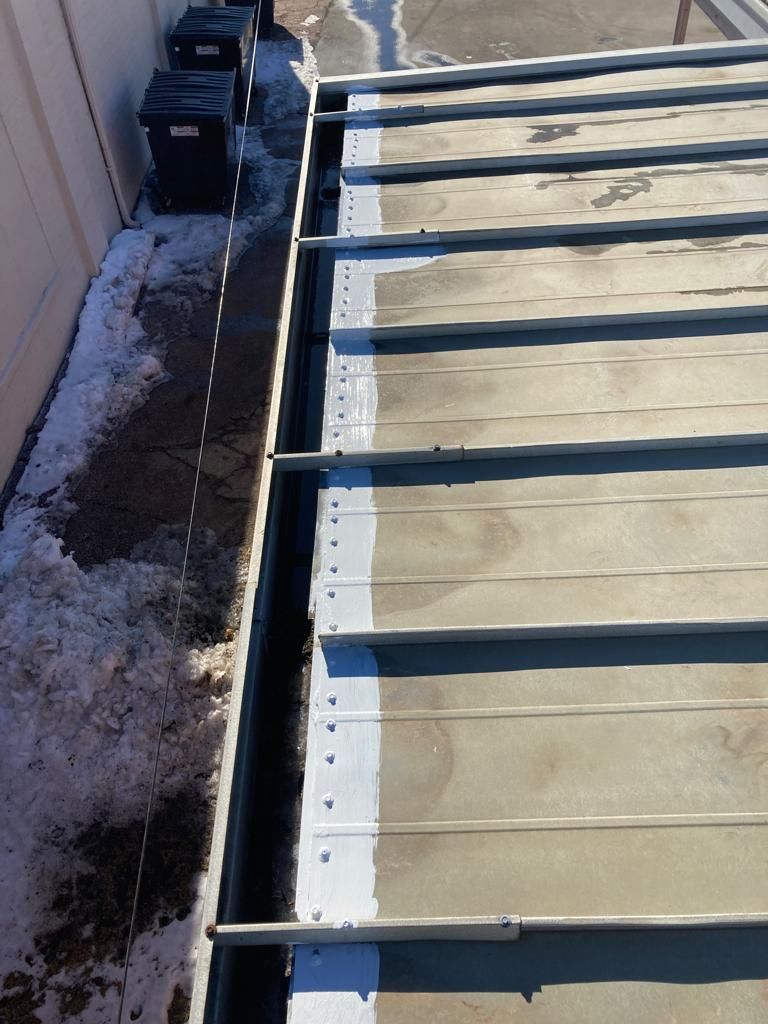 Roof Repair on a metal roof  by Grell Roofing, LLC
