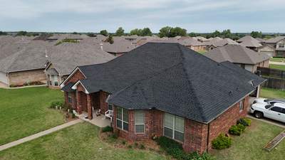 Roof Replacement in Mustang, OK by 5Coat Roofing & Construction