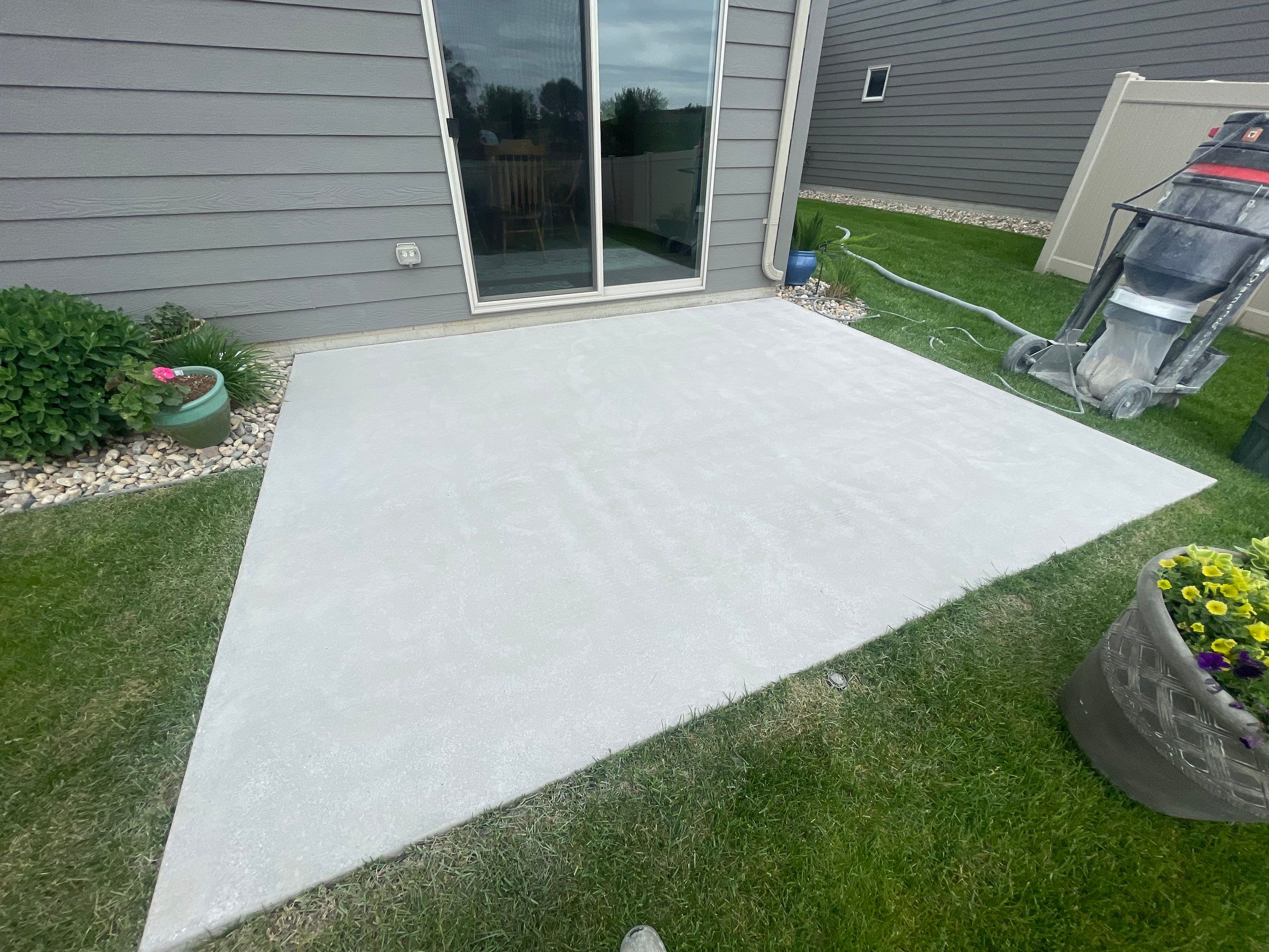 Custom Concrete Coating for Sioux Falls Patio and Front Walkway by Select Painting, Coatings & Garage Cabinets