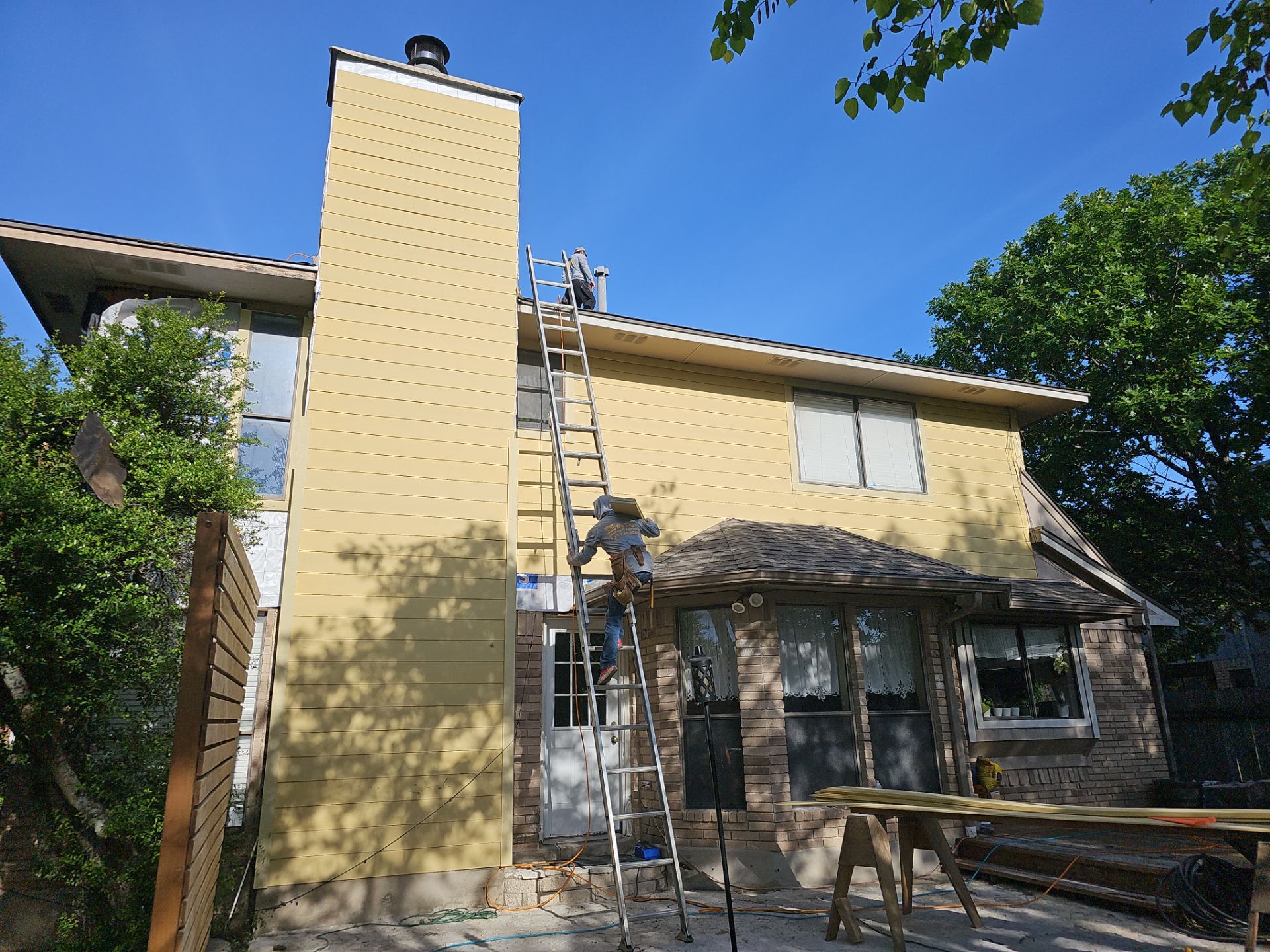 Siding Makeover  by DeZign Roofing & Exteriors