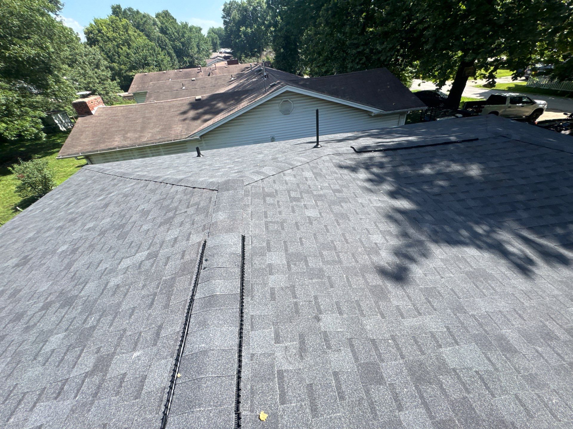 Residential Roofing Install - Atlas Pinnacle Pristine Shingles - Color Black Shadow  by Titan Commercial & Residential Roofing 