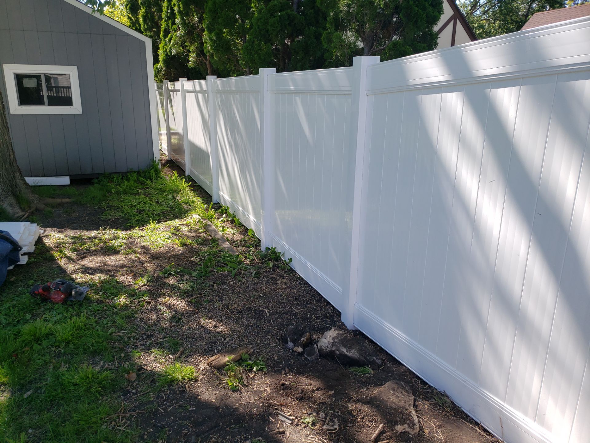 Residential White Vinyl Privacy Fence Installation in Waterloo by Perfect Picket Fence and Stain