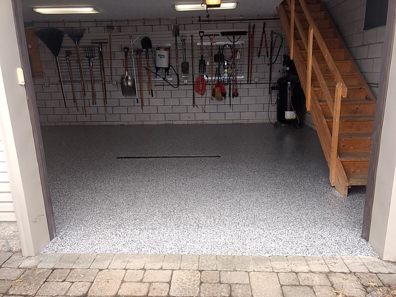 Garages Using Domino by Fantastic Floors by Miller Custom Exteriors 