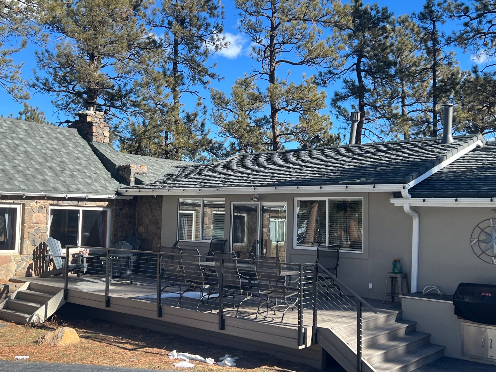 Residential Roofing Installation using Stone Coated Steel by Blue Peaks Roofing LLC 