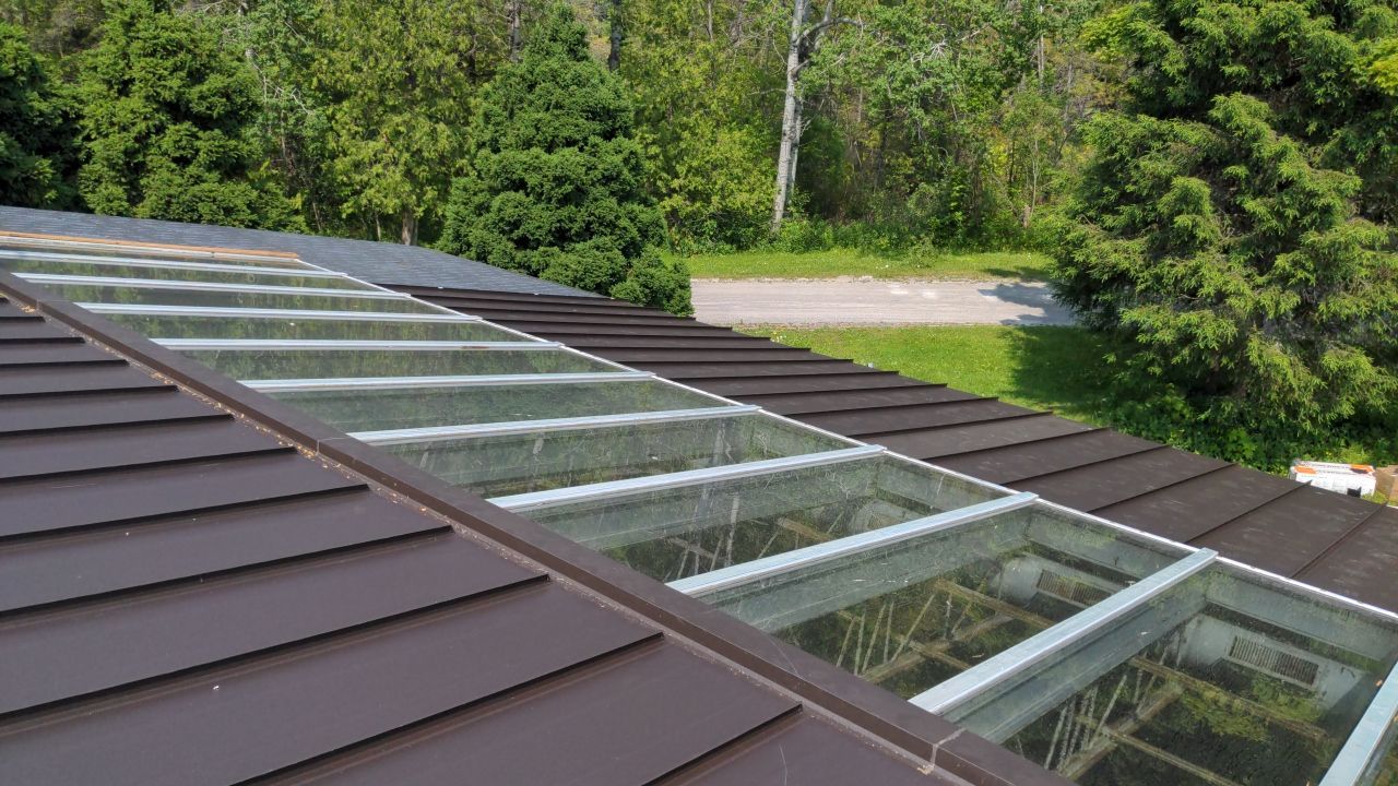 Roof Replacement using 16" Standing Seam Panels by Jay Carter Roofing & Sheet Metal