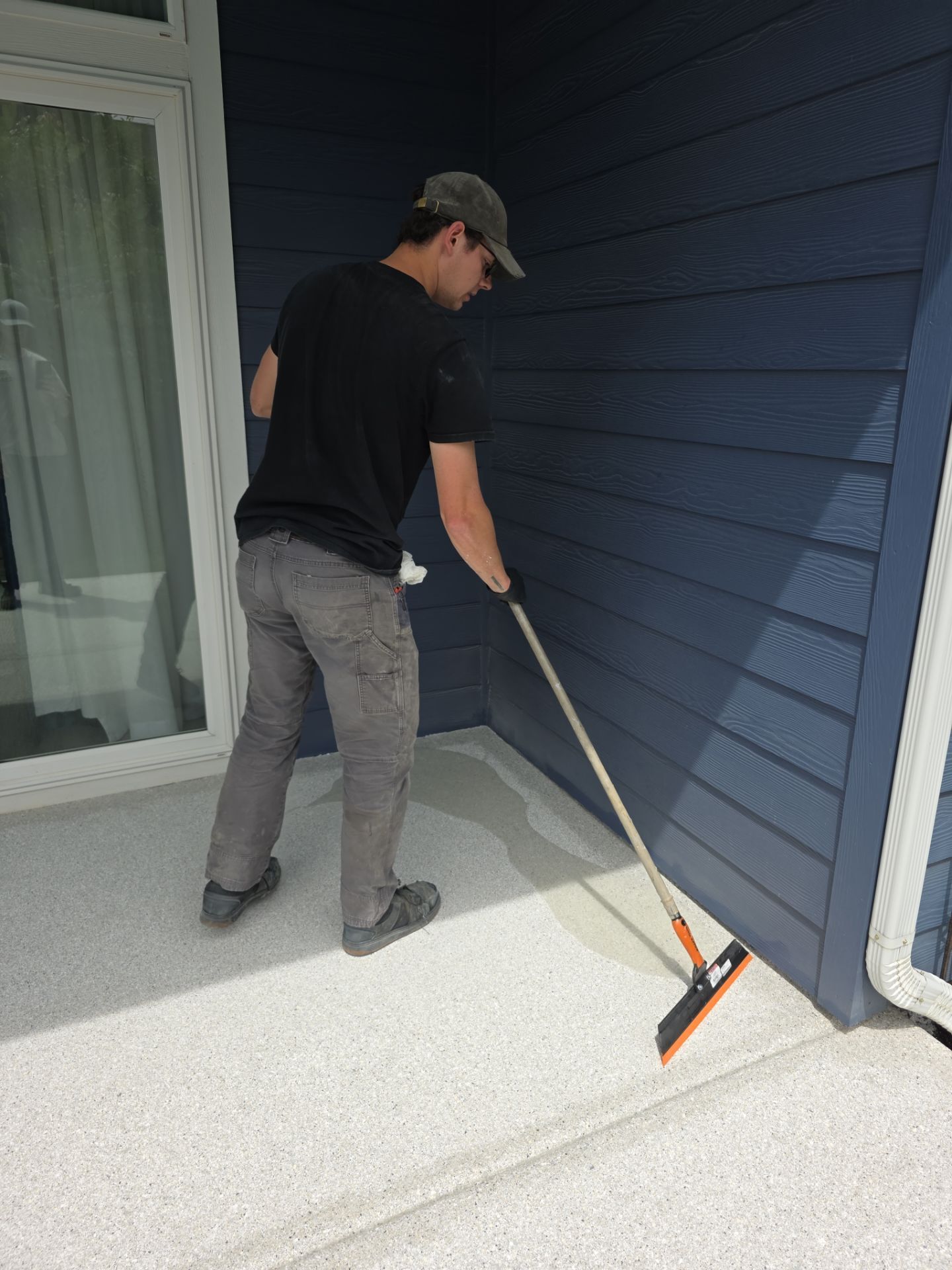 Battleship Hybrid Concrete Coating for Post Falls Patio and Driveway by Croc Coatings, LLC