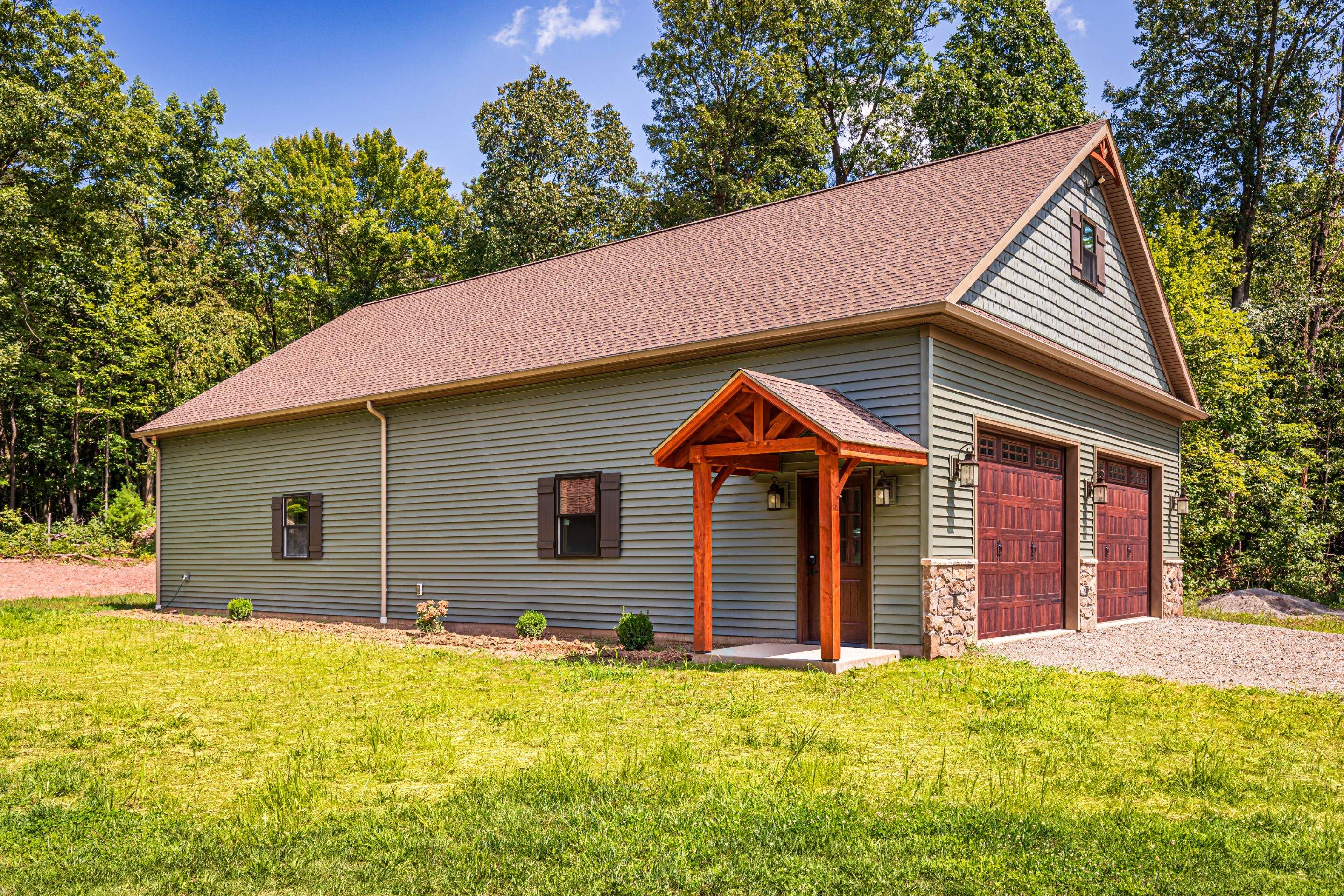 Custom Two-Story Garage with Finished Upper Leve by Esh Builders