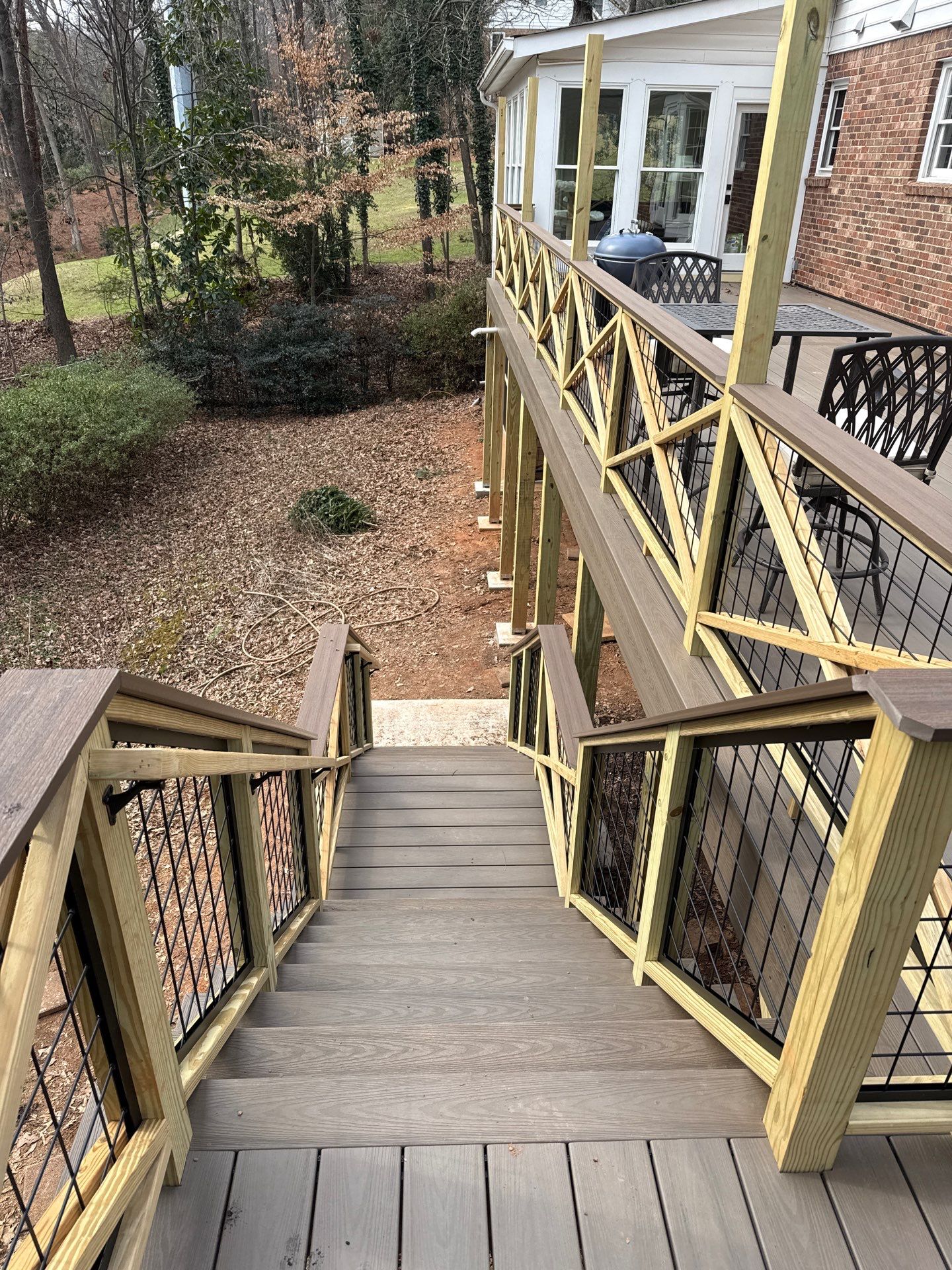 Deck Build and Screened-In Porch Install with Wild Hog 6' Black Mesh Panel Railing by Nelson Exteriors