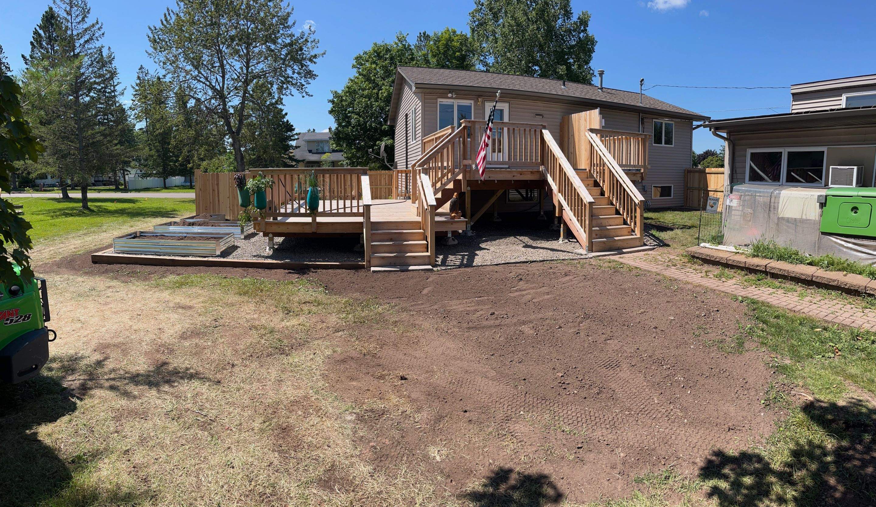 Multi-Level Cedar Deck by Anchor North Property Services