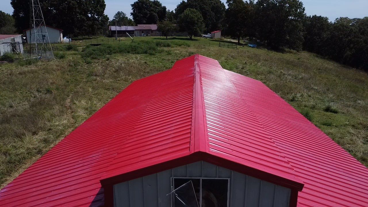 Residential Roofing Install - 29 Gauge G-Rib Metal - Color Brown & Crimson Red by Titan Commercial & Residential Roofing 