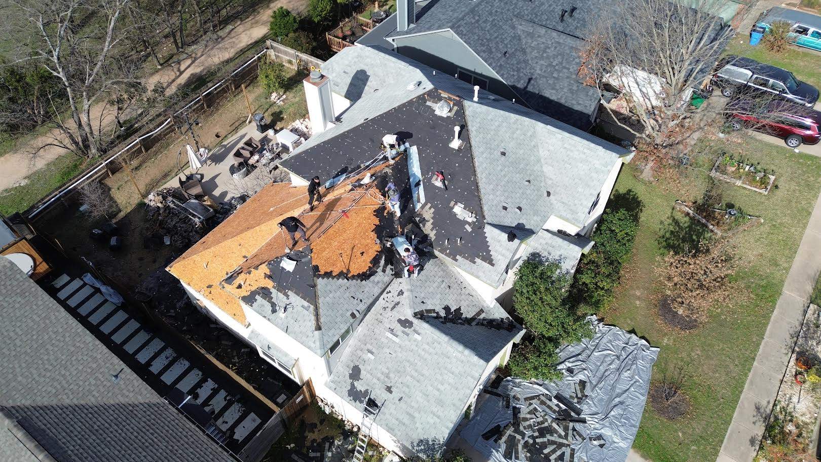 Three Tab Shingles To Metal Standing Seam by DeZign Roofing & Exteriors
