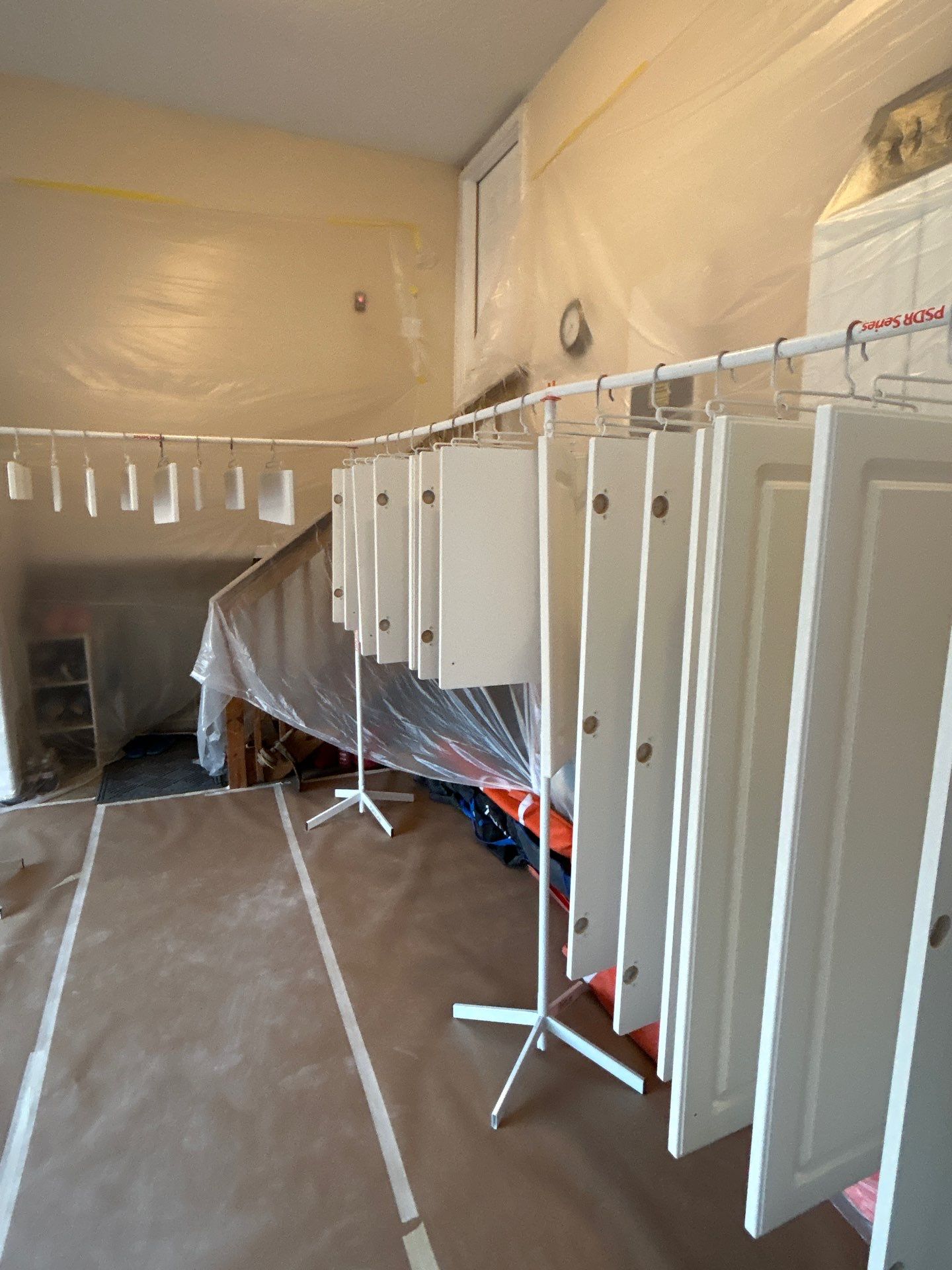 Cabinet painting by GonzalezPainters & Contractors Inc 