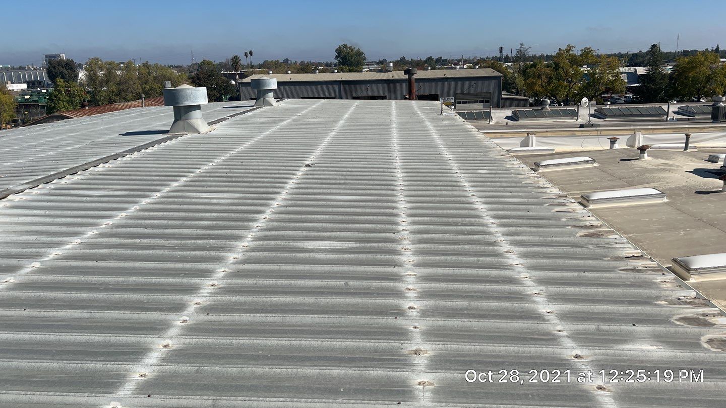 MR Roofing system using Conklin BenchPly system with PUMA top coat by Straight Edge Roofing Inc