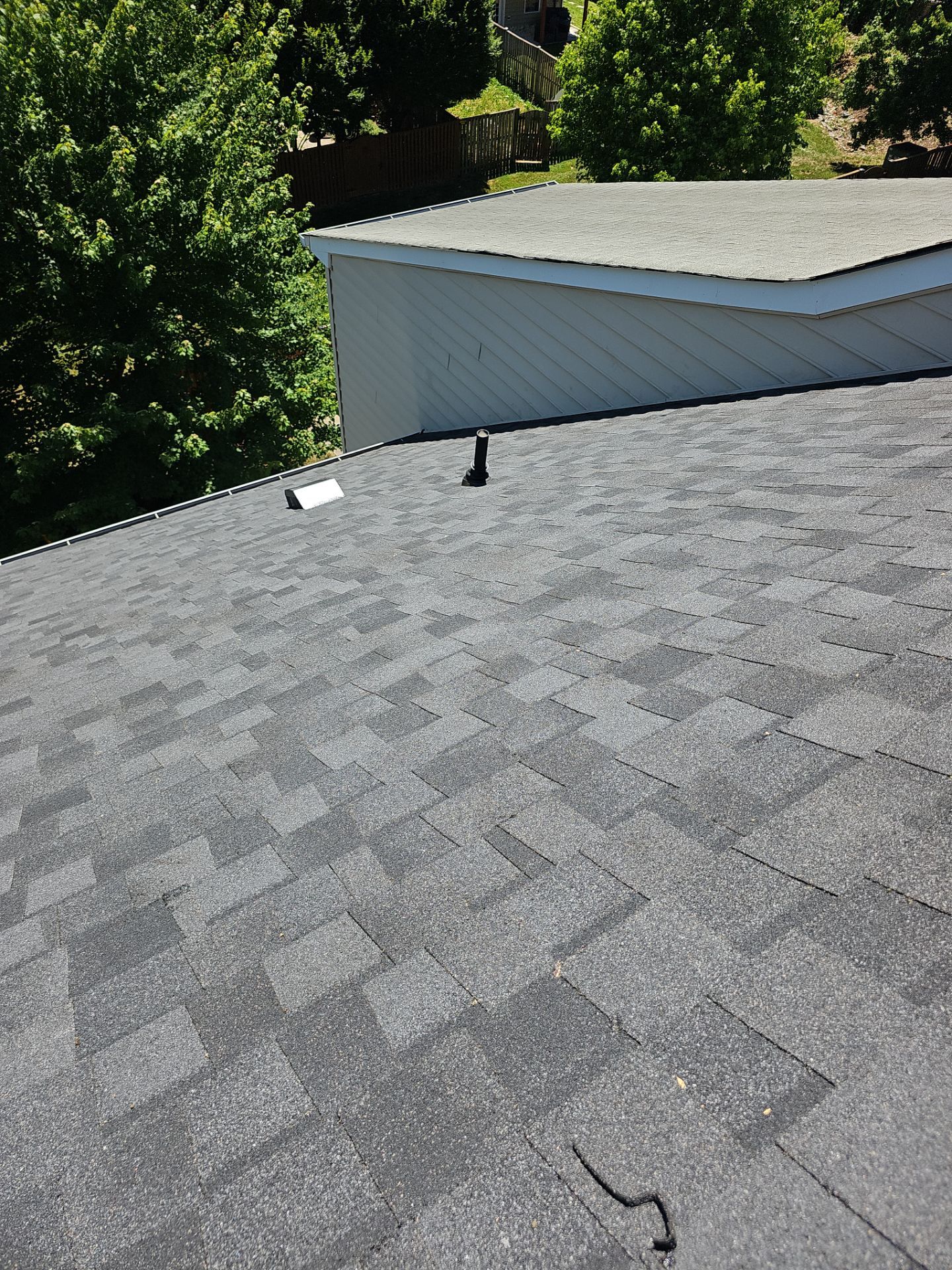 Roof Replacement - Moire Black by Winchester Roofing