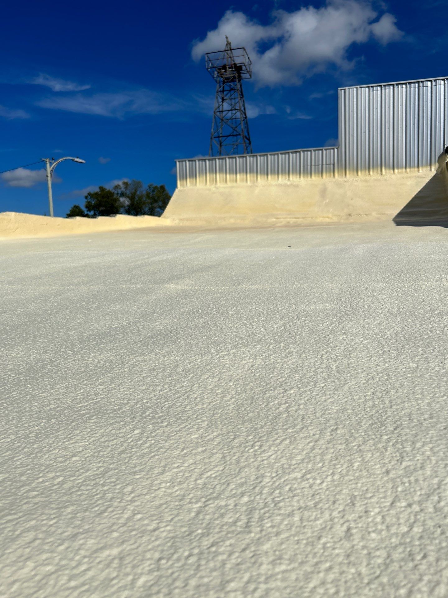 Downtown Gladewater Commercial Foam Roof Restoration – SPF + High-Tensile Acrylic by All Star Roofing LLC