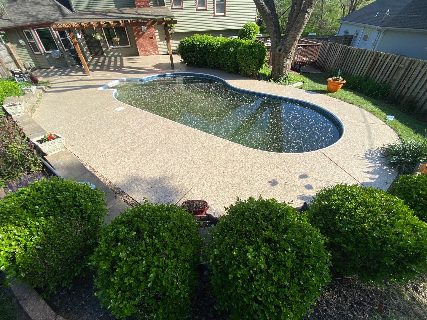 Pool Deck using Pecan by Select Painting, Coatings & Garage Cabinets