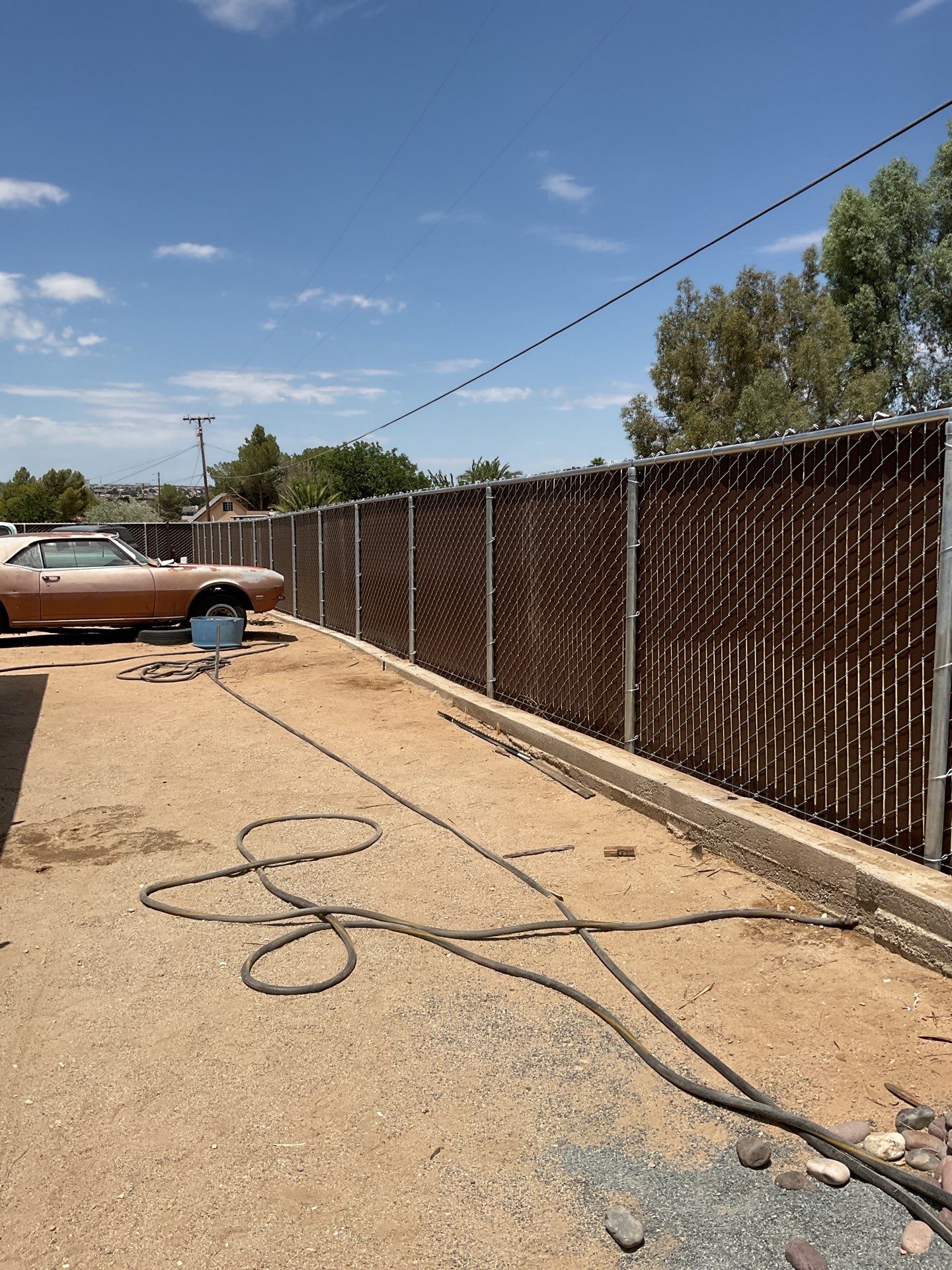 Dark Brown Privacy Chain Link Fence by Fence Guys Inc.