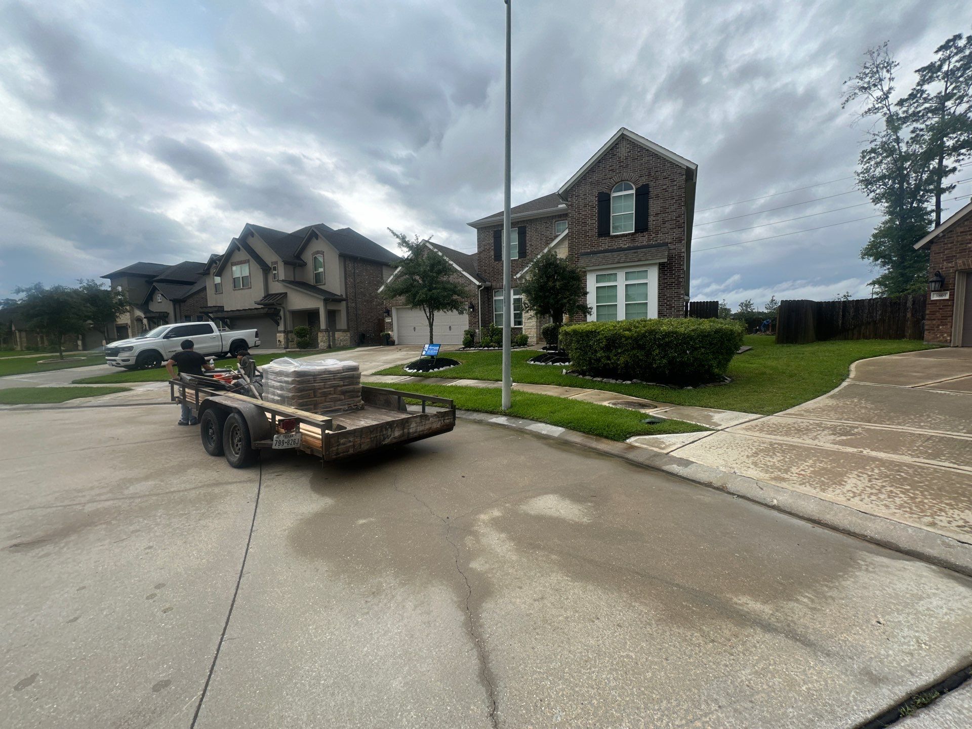 Covered patio and Summer Kitchen in Spring, TX by SophAlx LLC