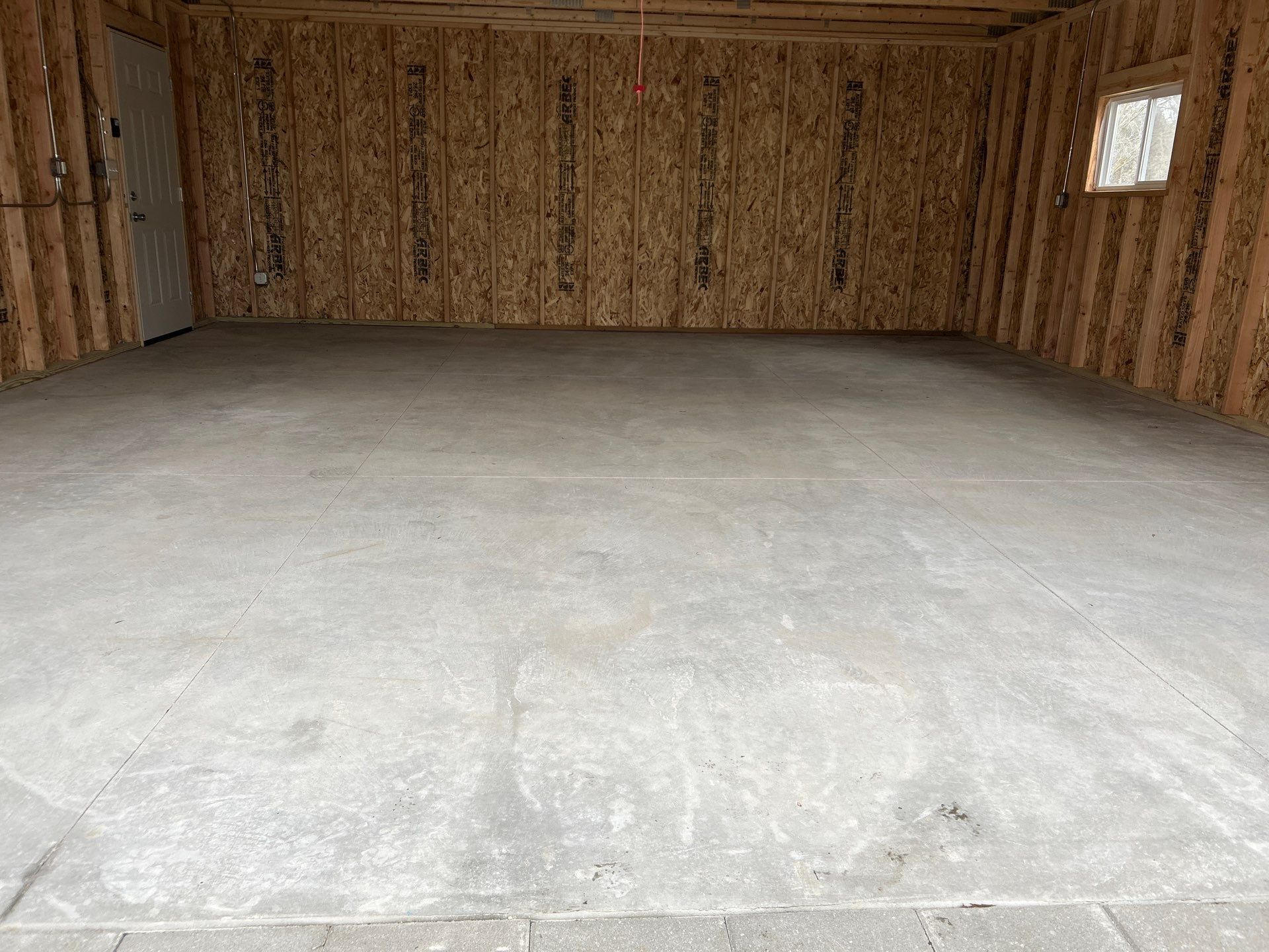 Bring Revival To Your Detached Garage  by Revival Concrete Coatings