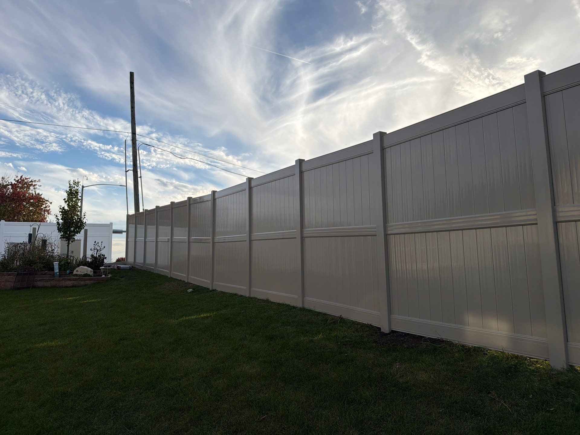 Adobe Vinyl Privacy Fence and Gate Installation in Cedar Falls by Perfect Picket Fence and Stain