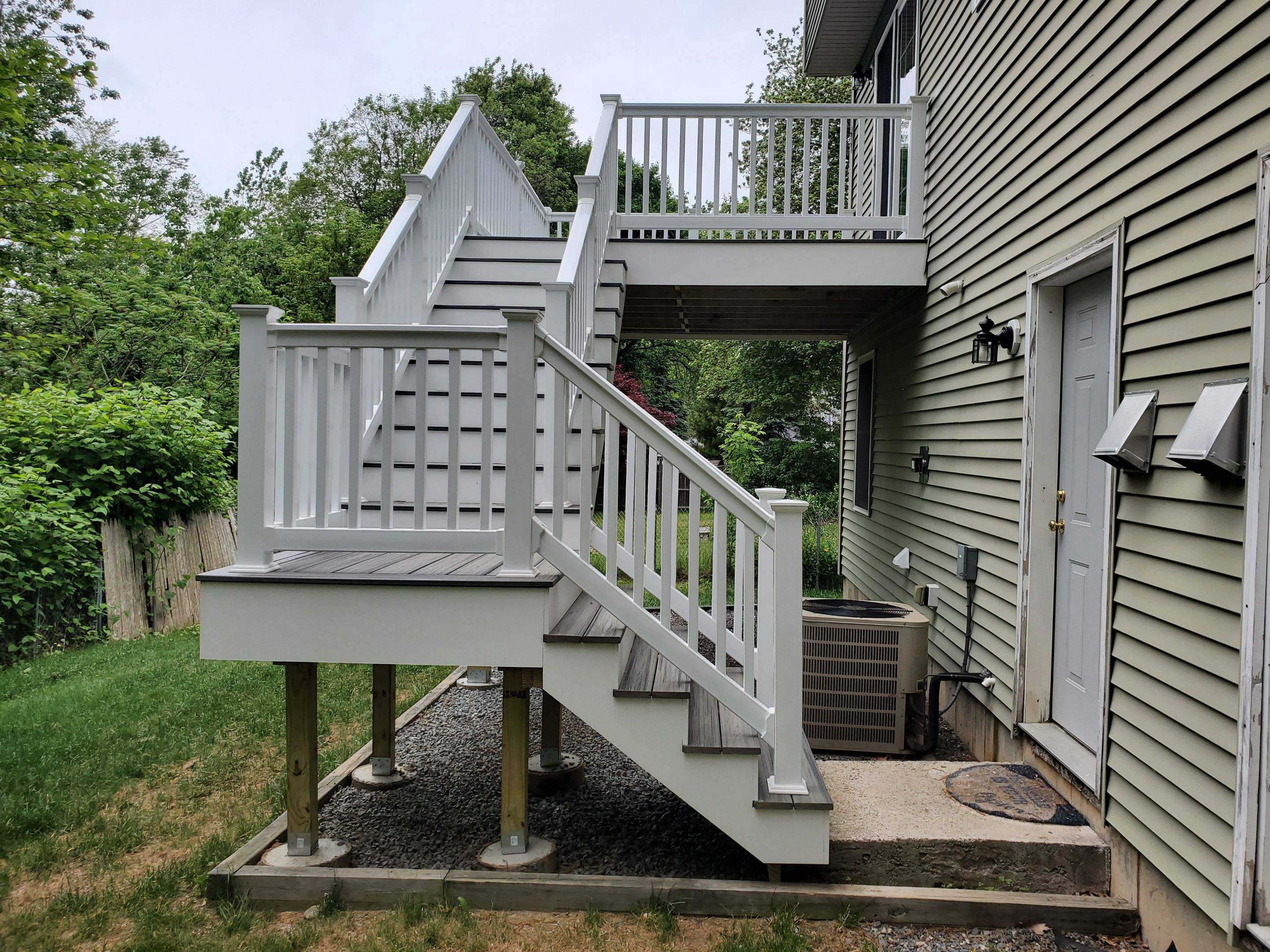 Porch/Deck Construction using Trex Decking by UBrothers Construction
