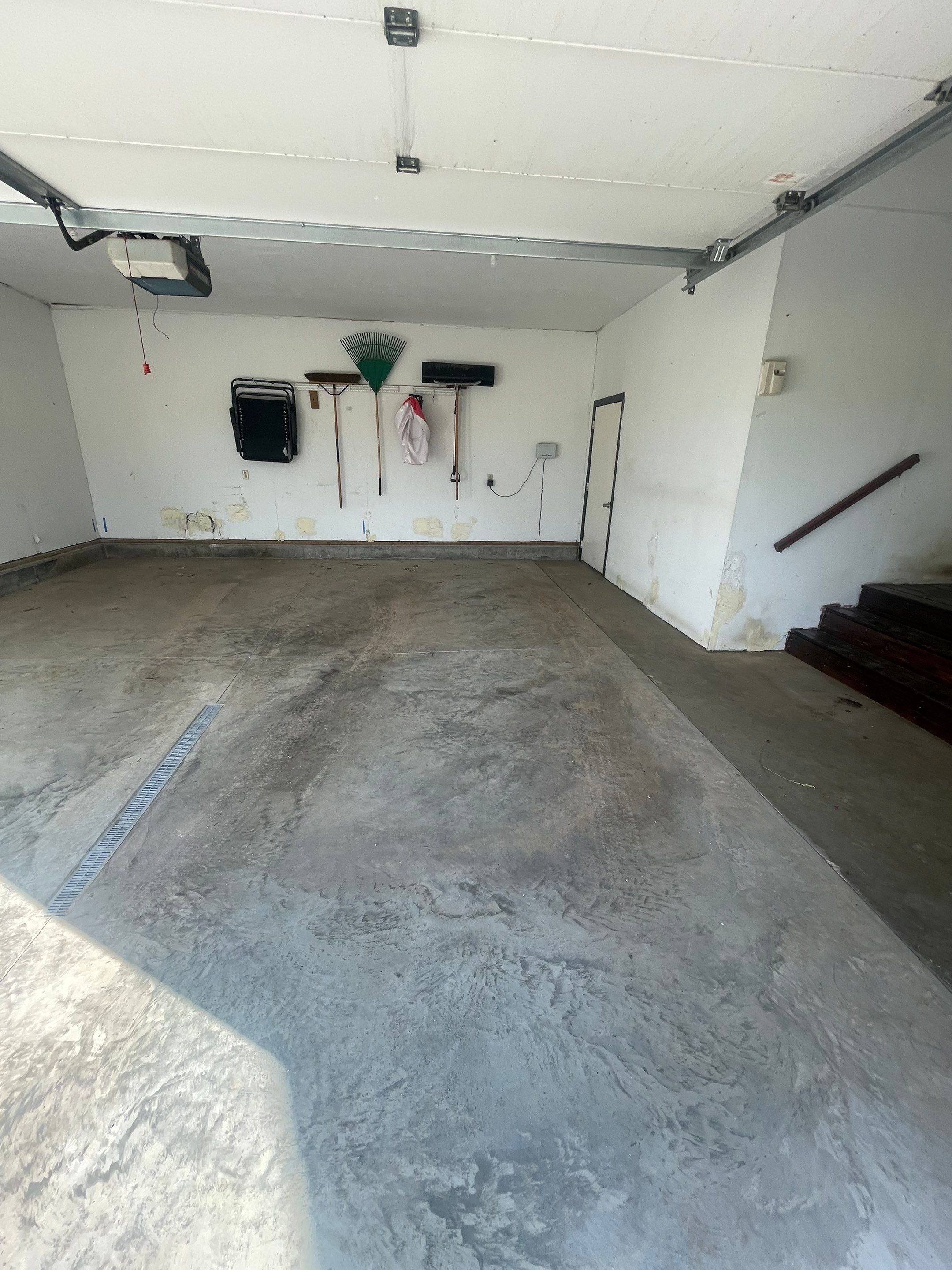 Hartford Residential Garage Floor Transformation With Decorative Chip Coating by Select Painting, Coatings & Garage Cabinets