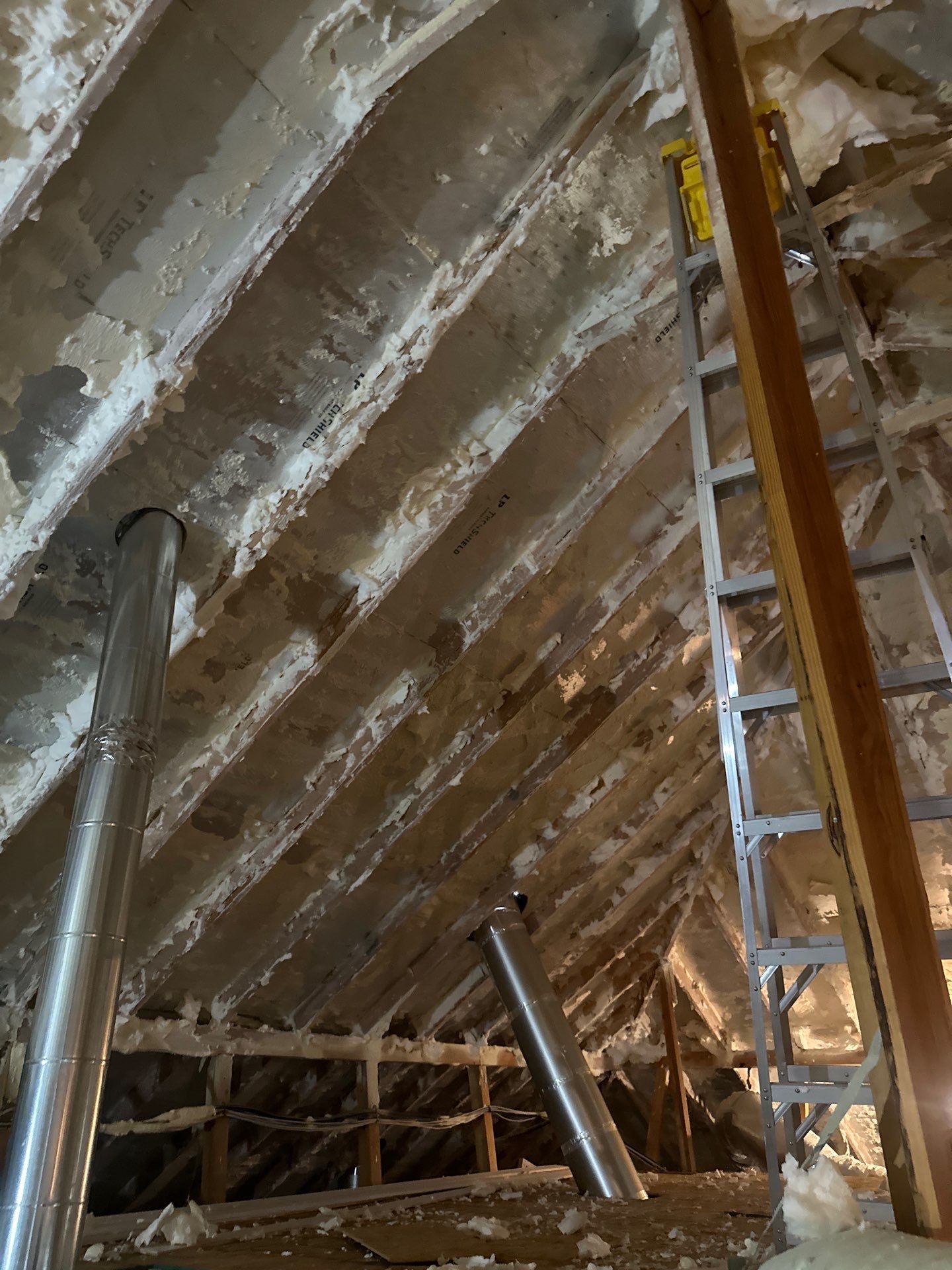 Spray foam insulation removal & re spray by Apex Insulation Solutions