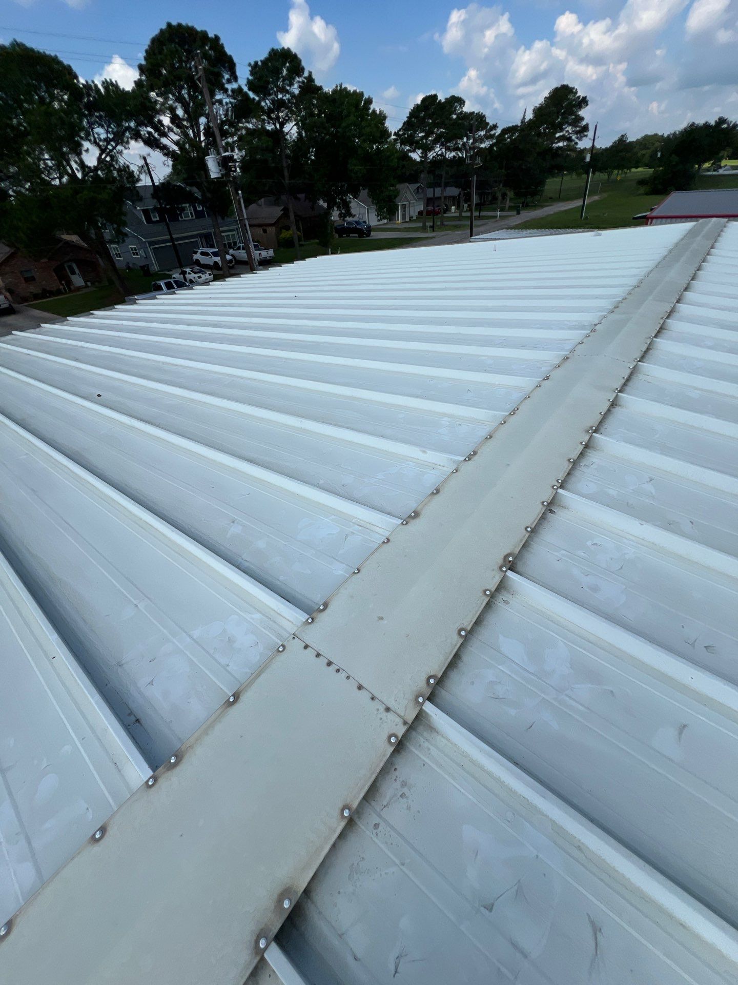 Commercial Roofing Repair using Metal by Roof Repair Company