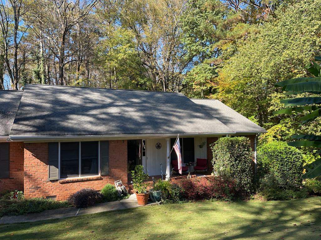 Gable Siding and Rotten Wood Replacements in Atlanta, GA with New Door and Window Installs by Nelson Exteriors 