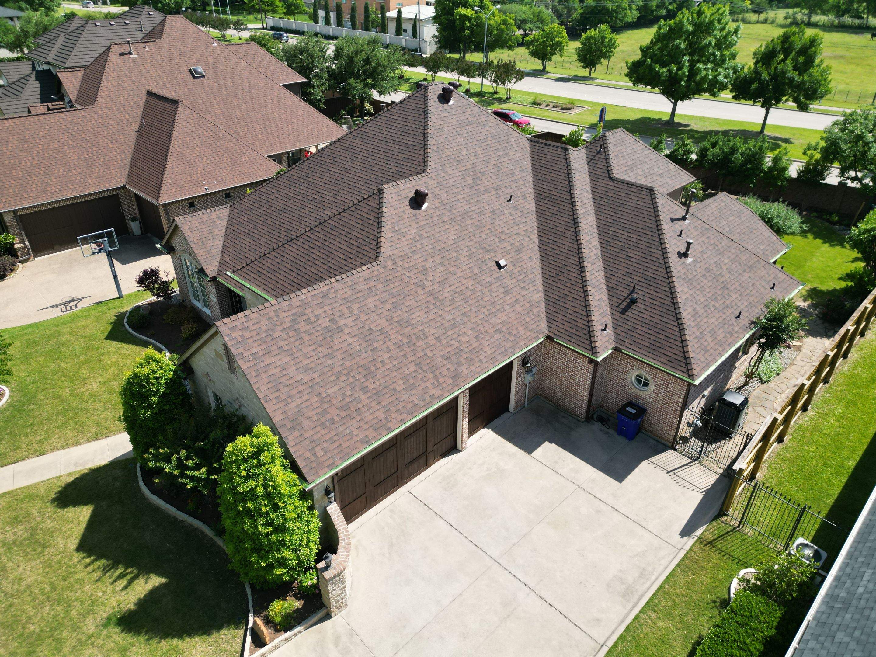 Residential Roofing Installation using Malarkey Legacy Scotchgard Shingles by Harvey Roofing & Construction