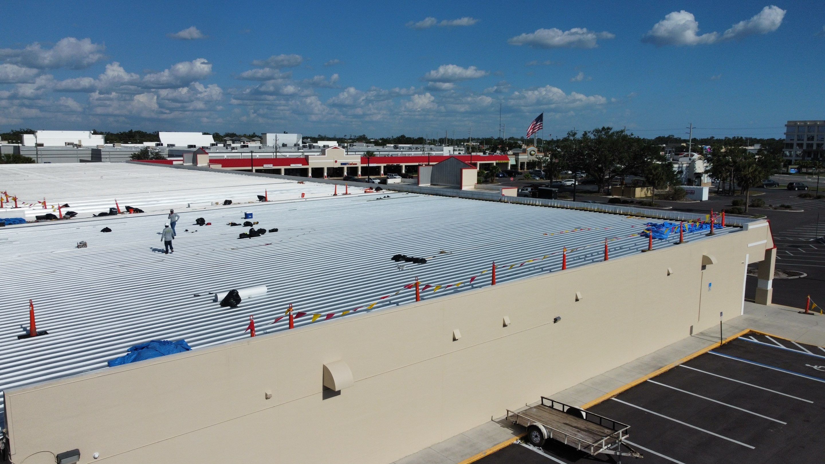 Commercial Metal Roof Replacement at Shopping Plaza in Port Charlotte by CES Roofing