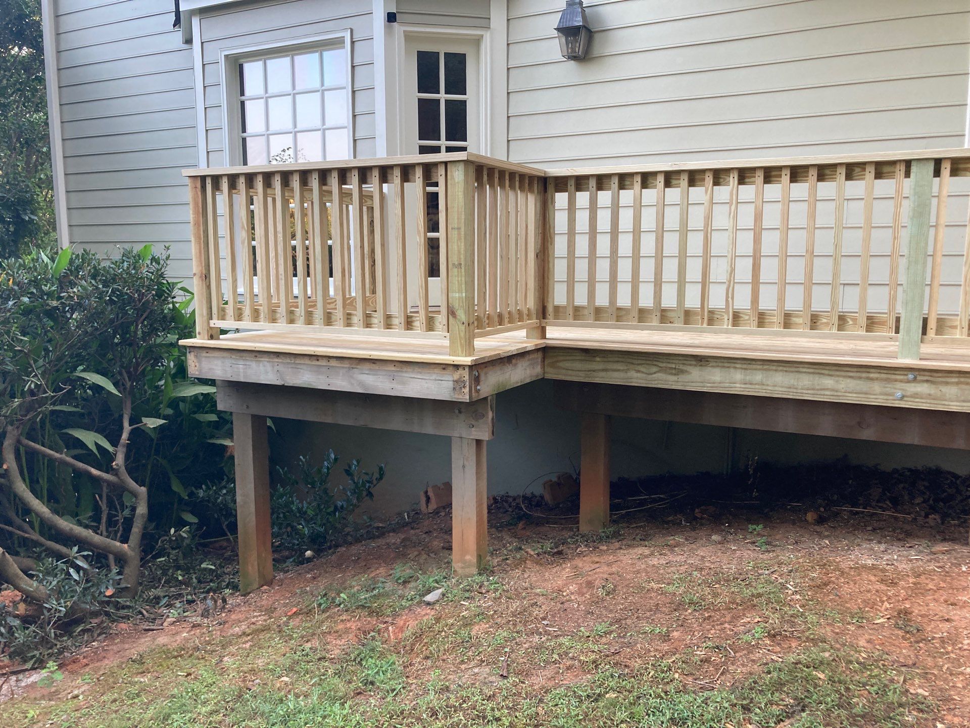 Pressure Treated Wood Resurface by Nelson Exteriors 