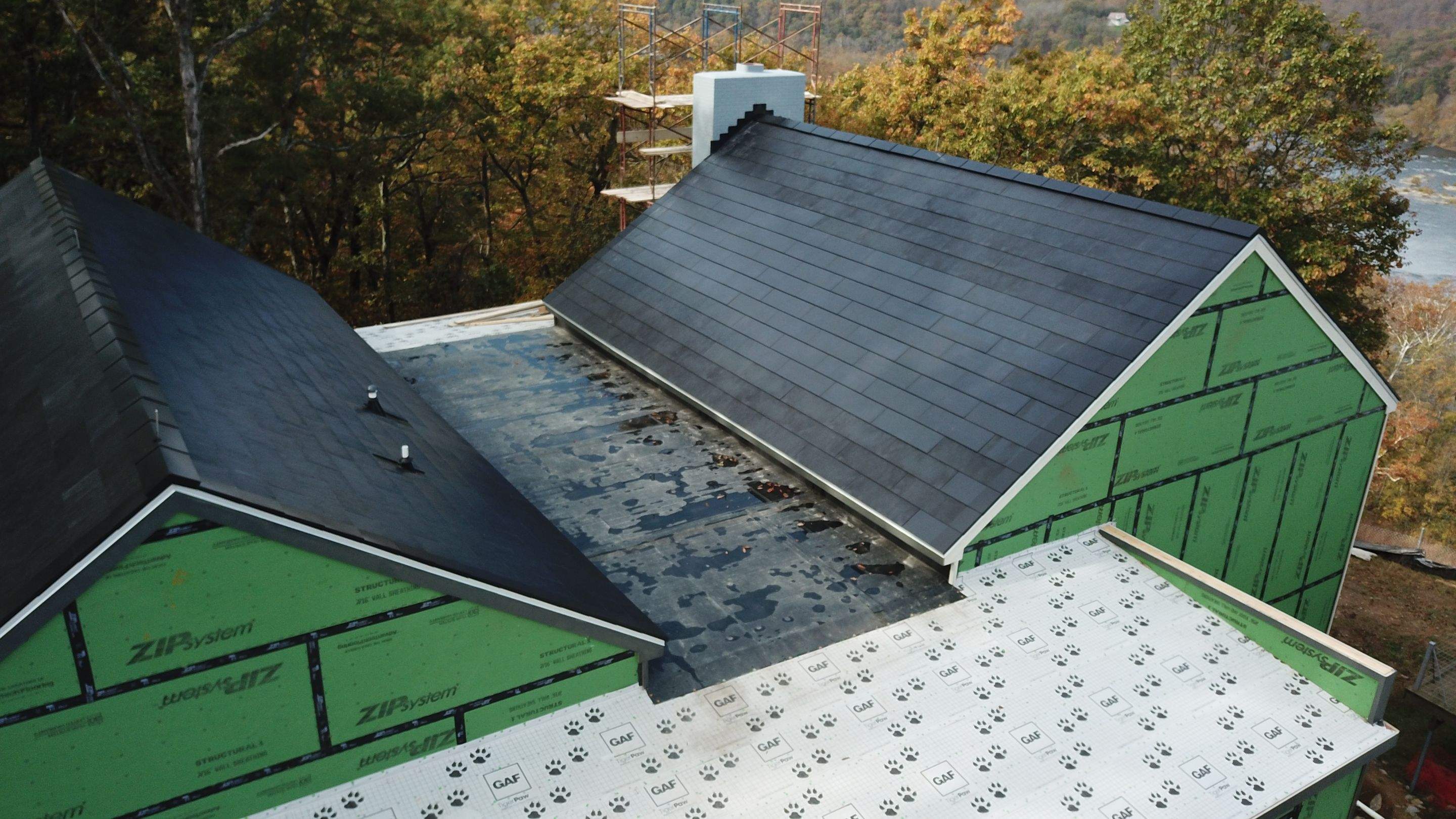 Roof Installation using Tesla Solar Roof V3 by American Home Contractors