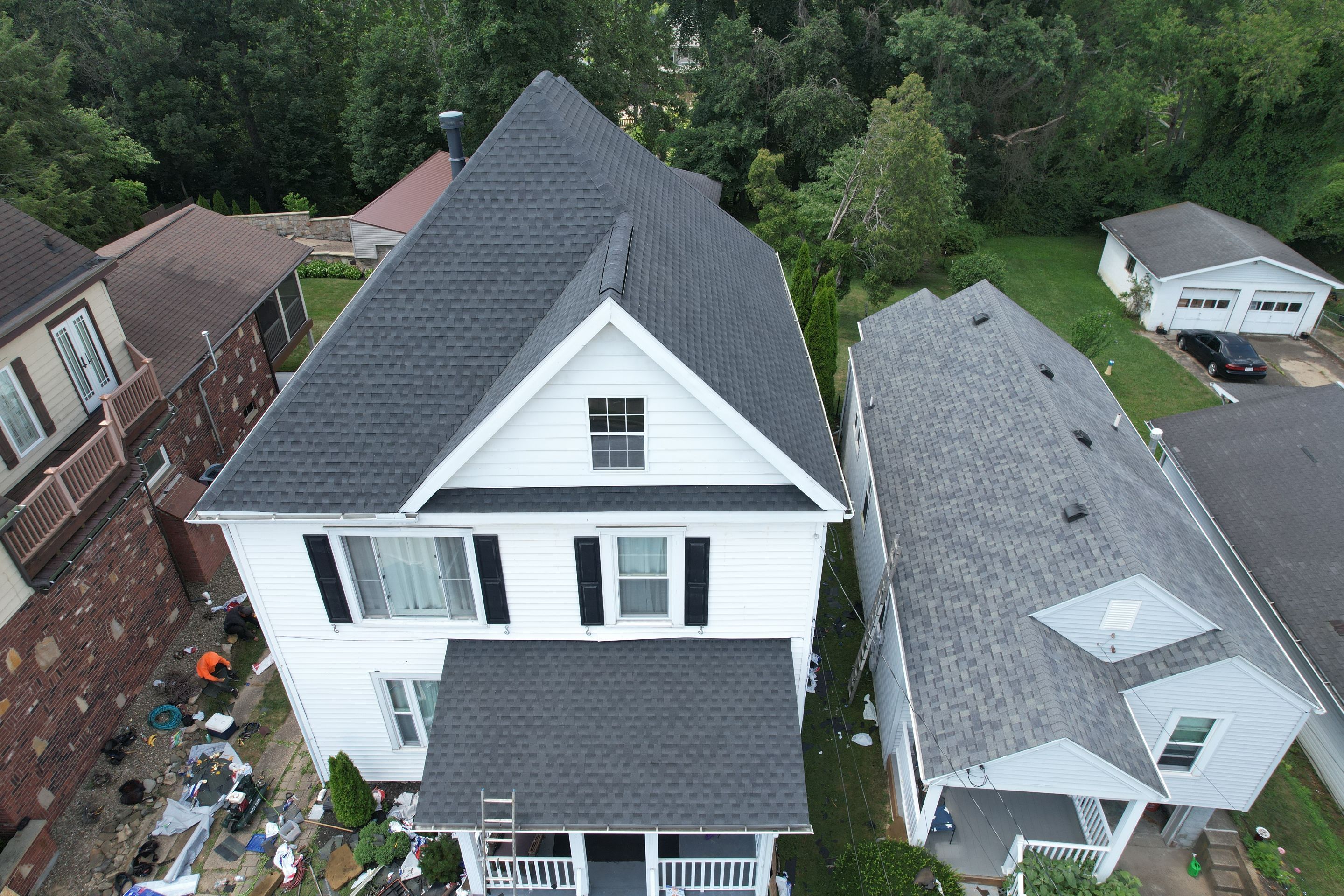 Residential Roofing Installation using GAF Timberline HDZ Charcoal by Rainstoppers Roofing