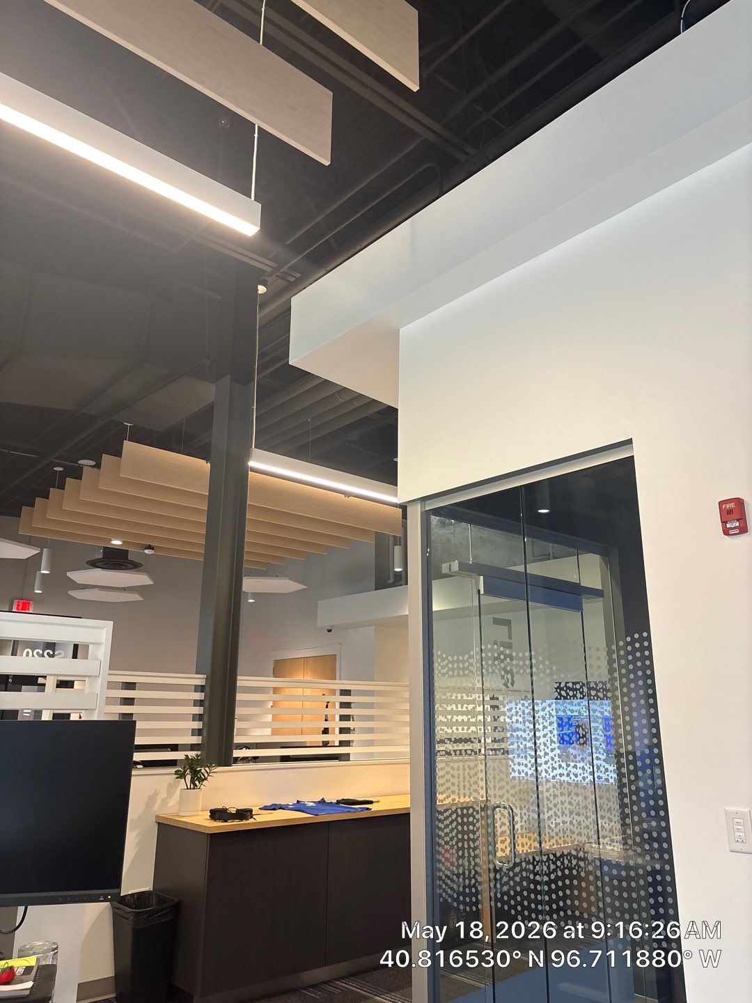Modern Office Interior Fit-Out with Acoustic Baffles in Lincoln by CompanyCam Sales Demo