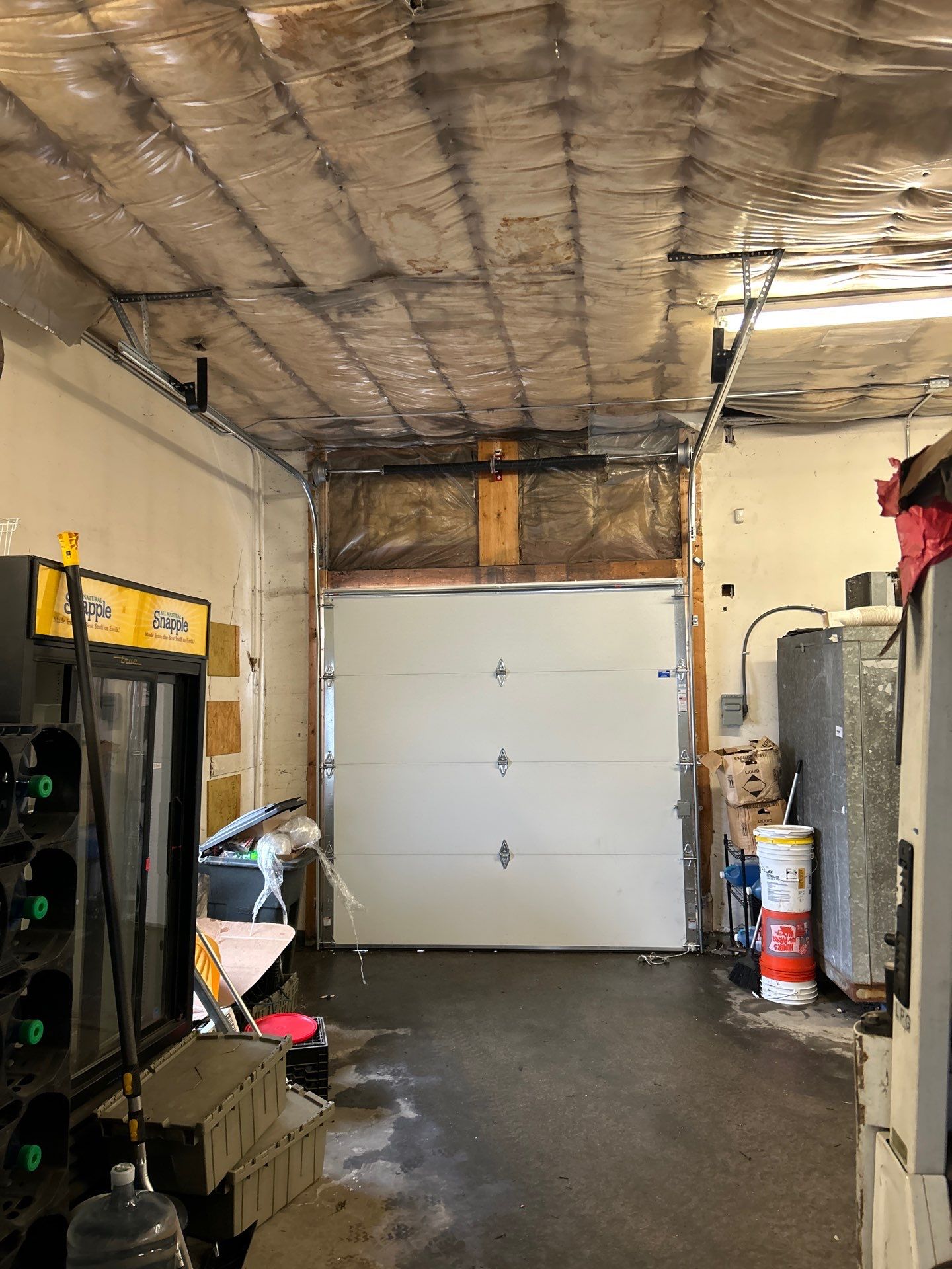 Door Installation using Raynor Energy Core Garage Door by Keene Door