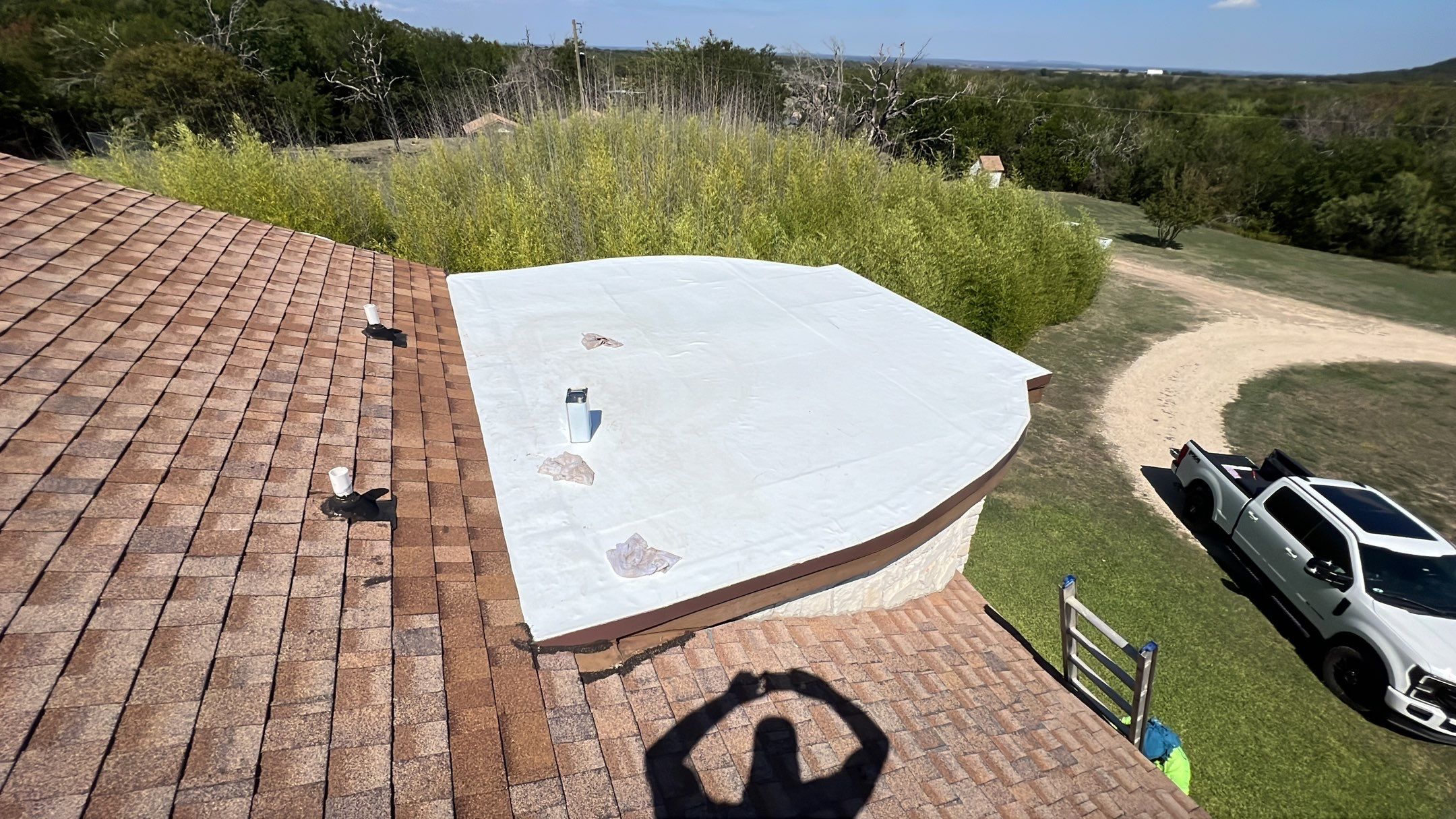 Residential Roofing Installation using TPO Flat Roof by Harvey Roofing & Construction