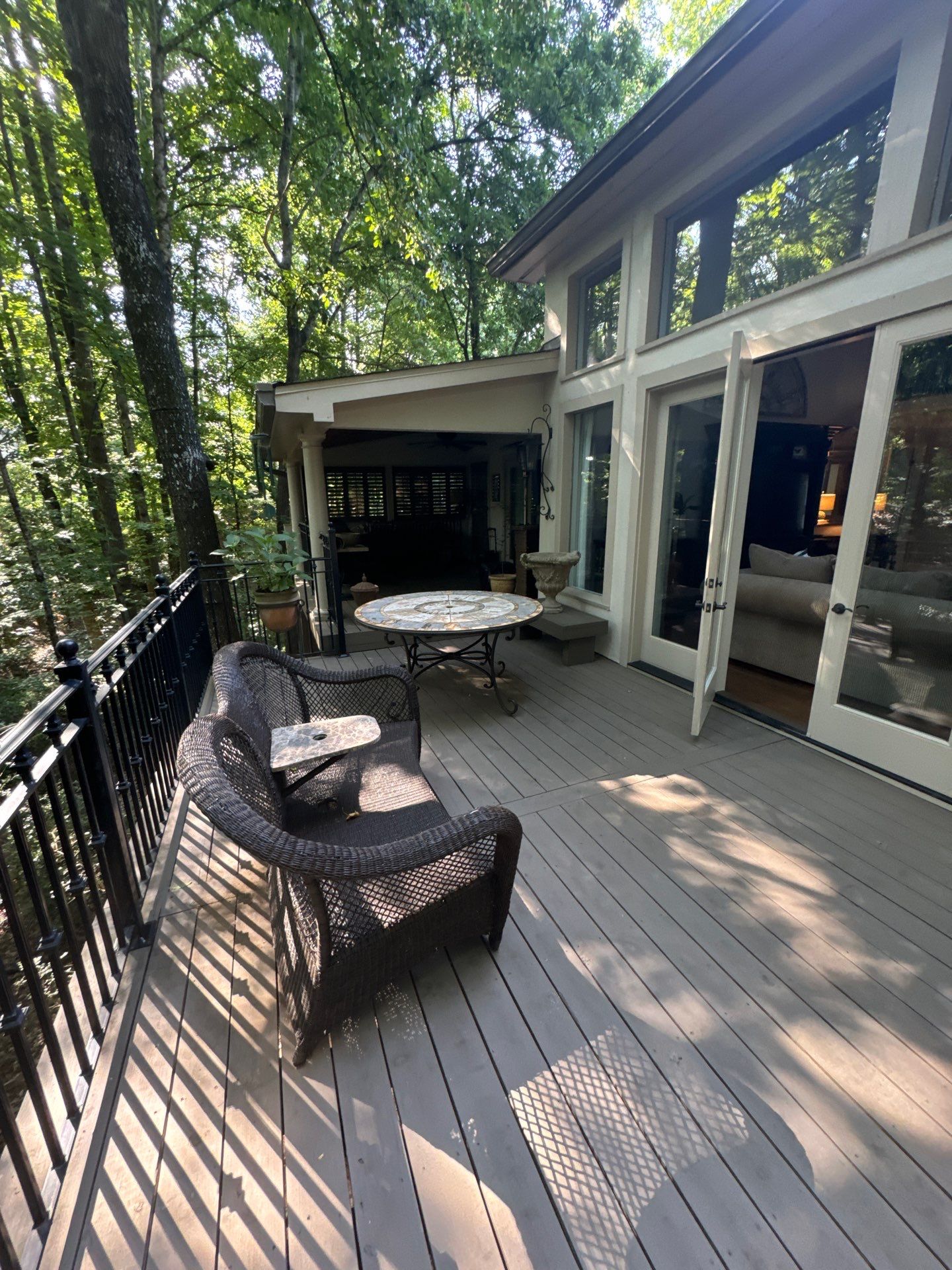 Custom Tiered Composite Deck and Covered Porch in Alpharetta by Swift Home Renovations