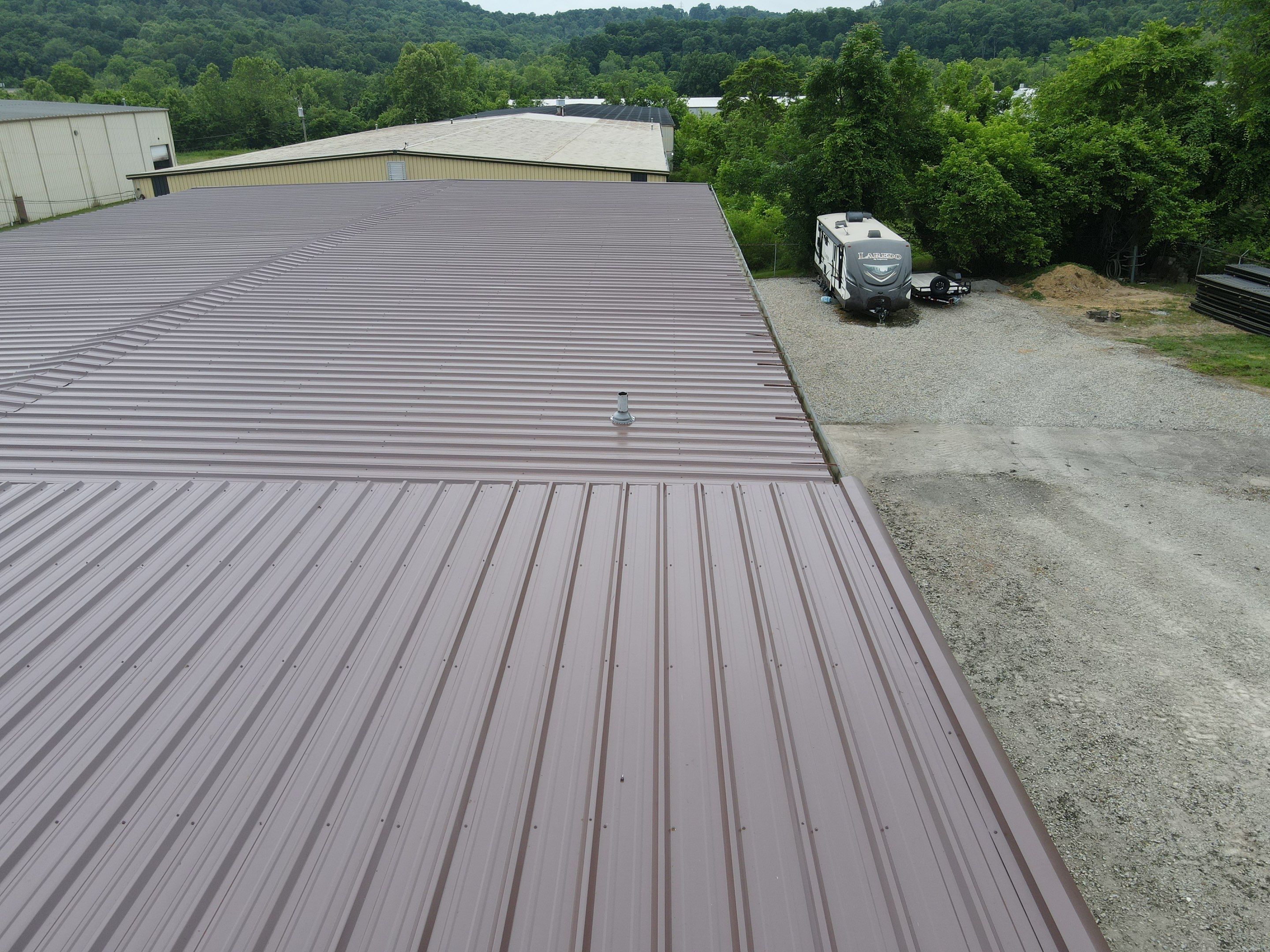 Commercial Roofing Installation using Metal by Rainstoppers Roofing