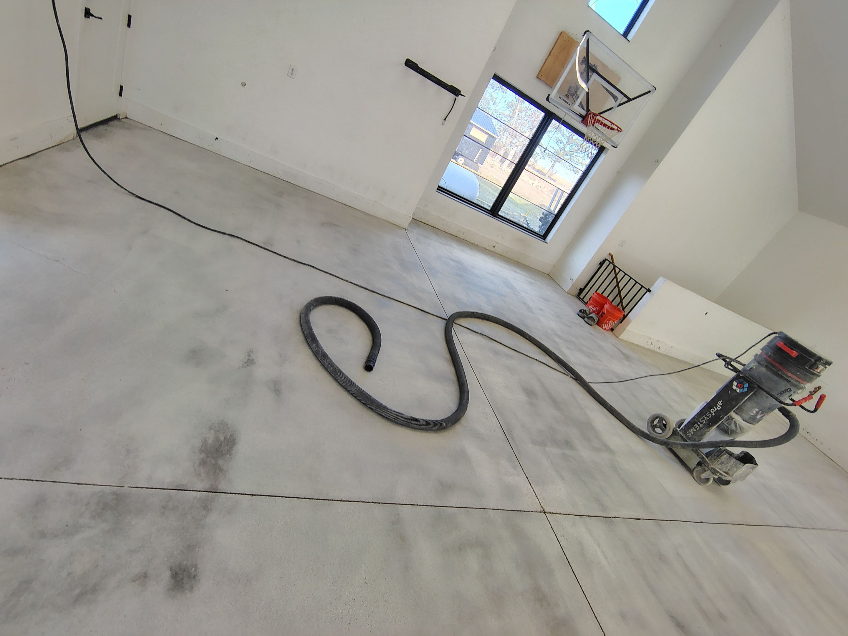 Epoxy Flake Garage Floor and Stair Coating in Sioux Falls by Select Painting, Coatings & Garage Cabinets