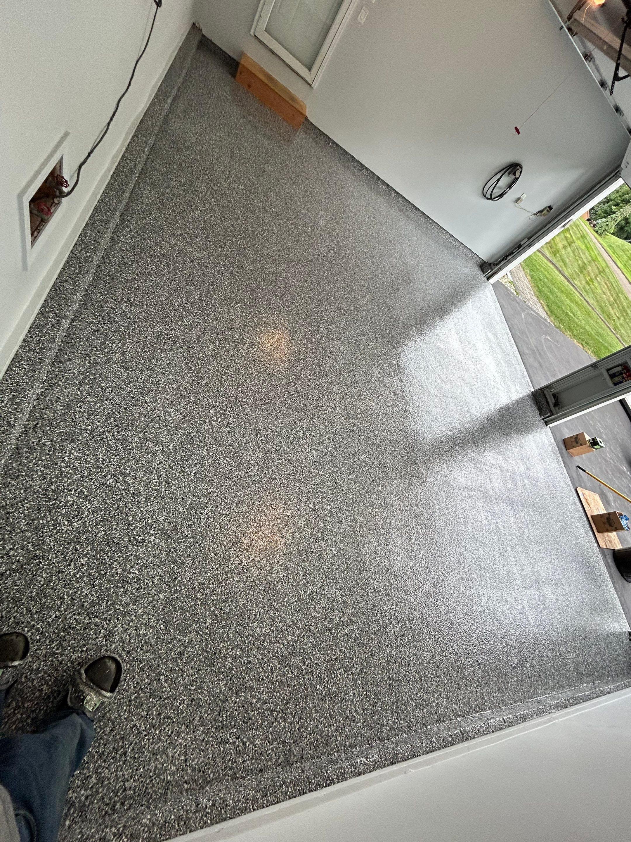 Wombat Concrete Floor Coating Transformation by DiGiorgi Roofing and Siding Inc