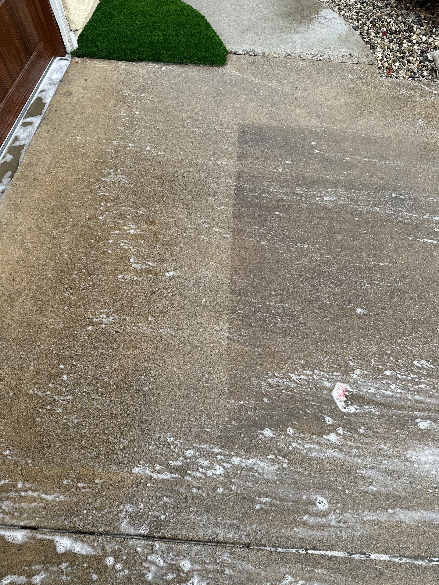 Orange County driveway restoration pressure washing by Property Cleaning Experts, LLC