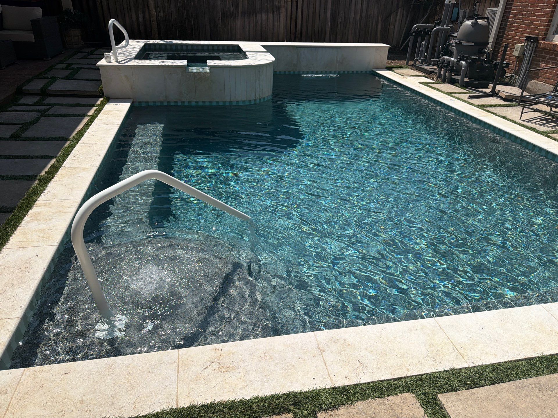 Modern Geometric Pool with Raised Spa and Travertine Deck by Pinnacle Pools and Spas - DFW