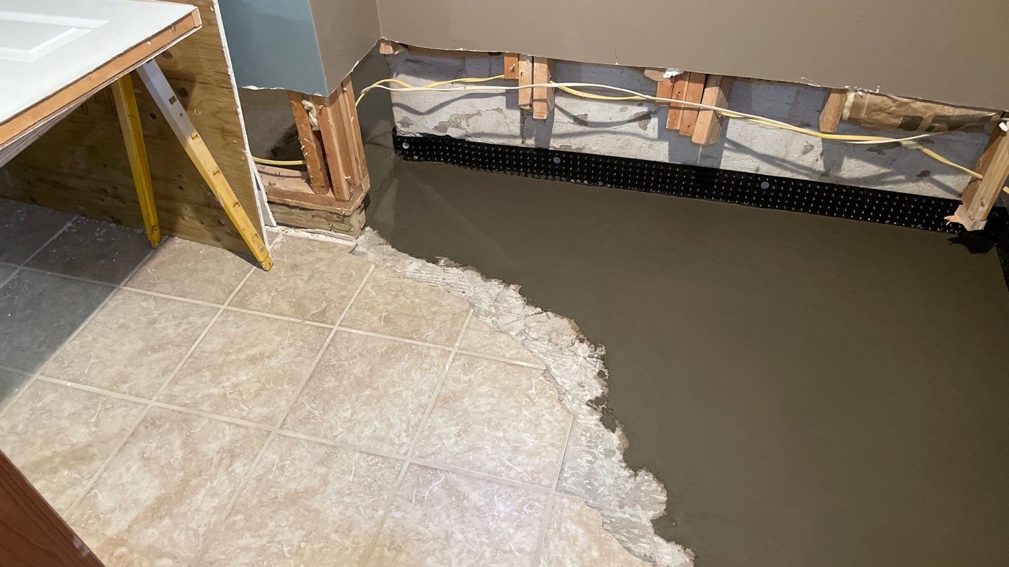 Drain Tile in Minneapolis for Kristen & Taylor by Waterproofing Northeast