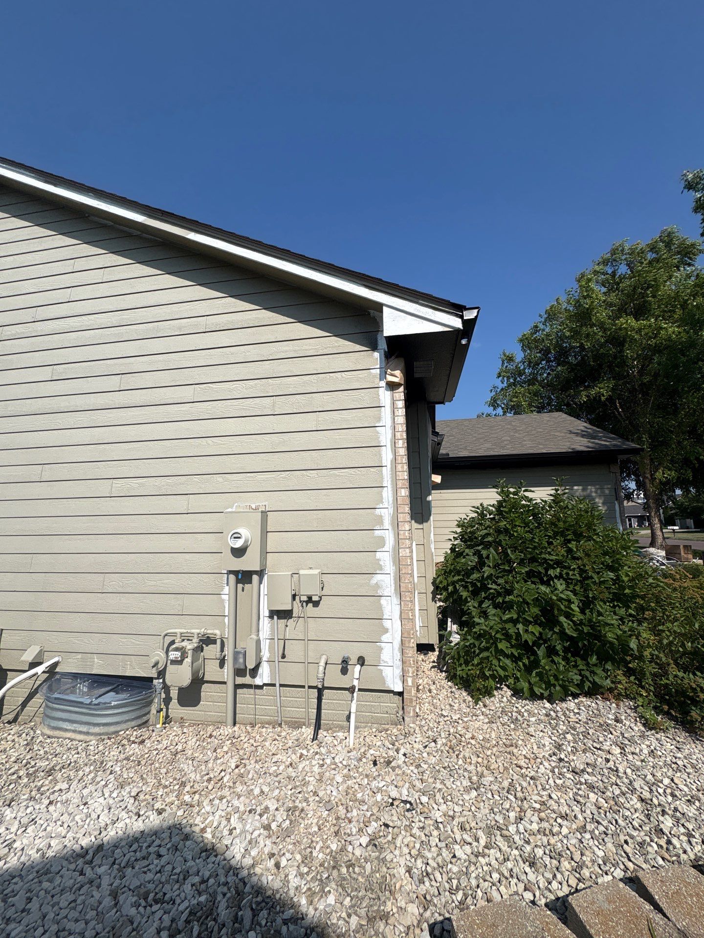 Residential Exterior Painting and Siding Refresh in Sioux Falls by Select Painting, Coatings & Garage Cabinets