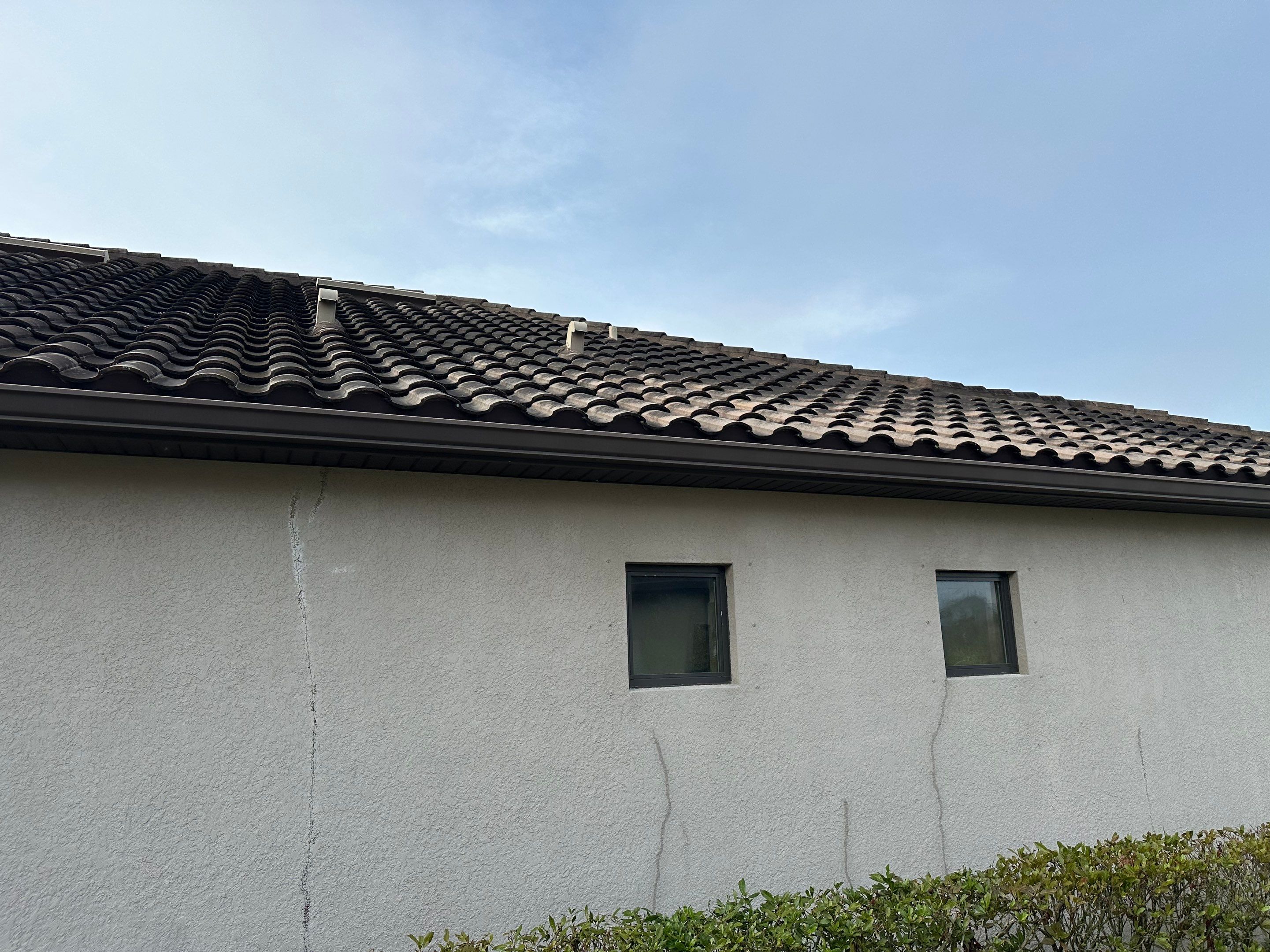 Concrete Tile Roof, Paver Pool Deck, Screen Enclosure & Driveway Cleaning in Artisan Lakes Esplanade, Palmetto, FL | Sunshine AquaWash by Sunshine AquaWash