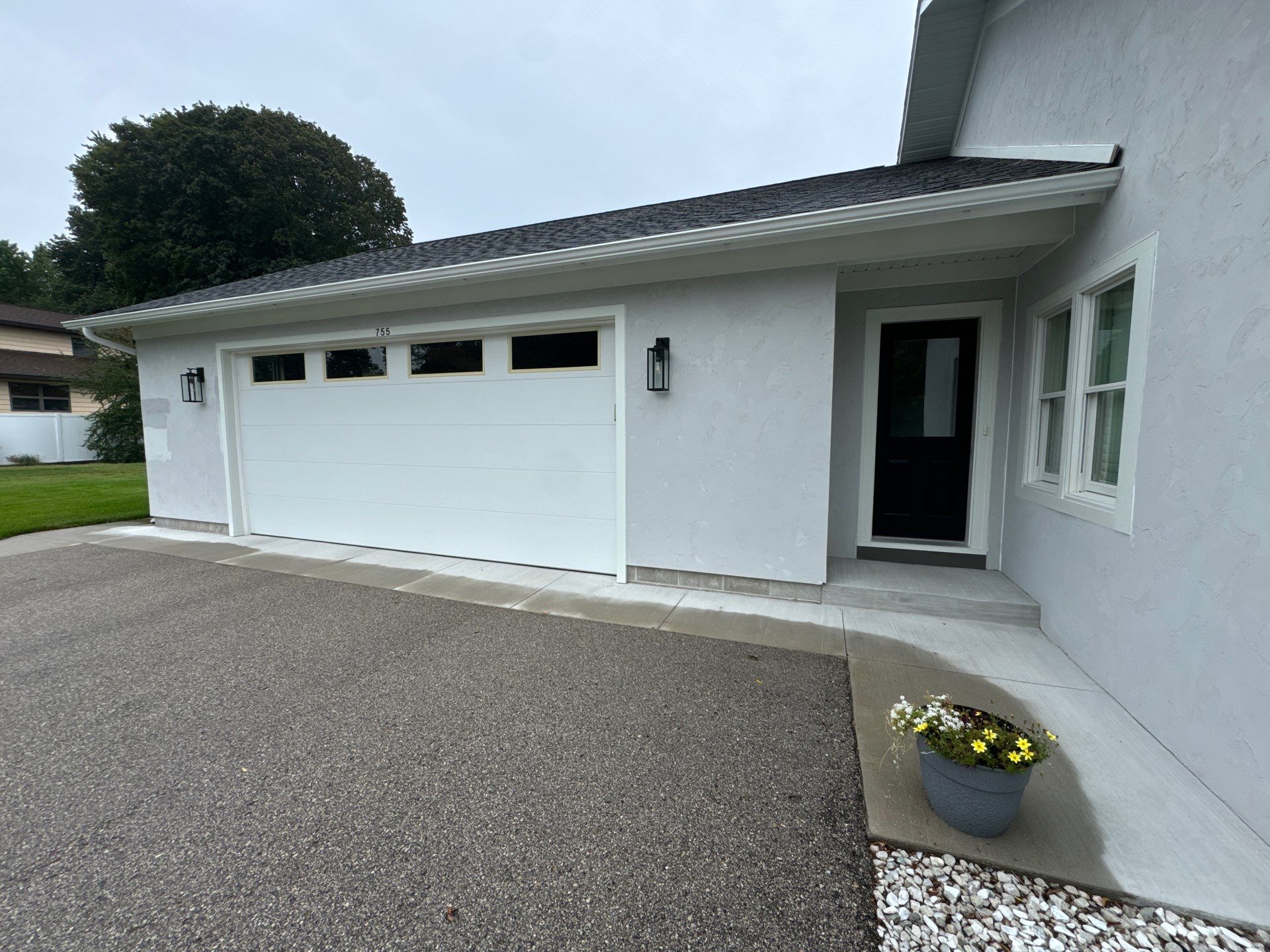 Norton Shores Residential Stucco Repair and Exterior Painting Refresh by Gordon Painting